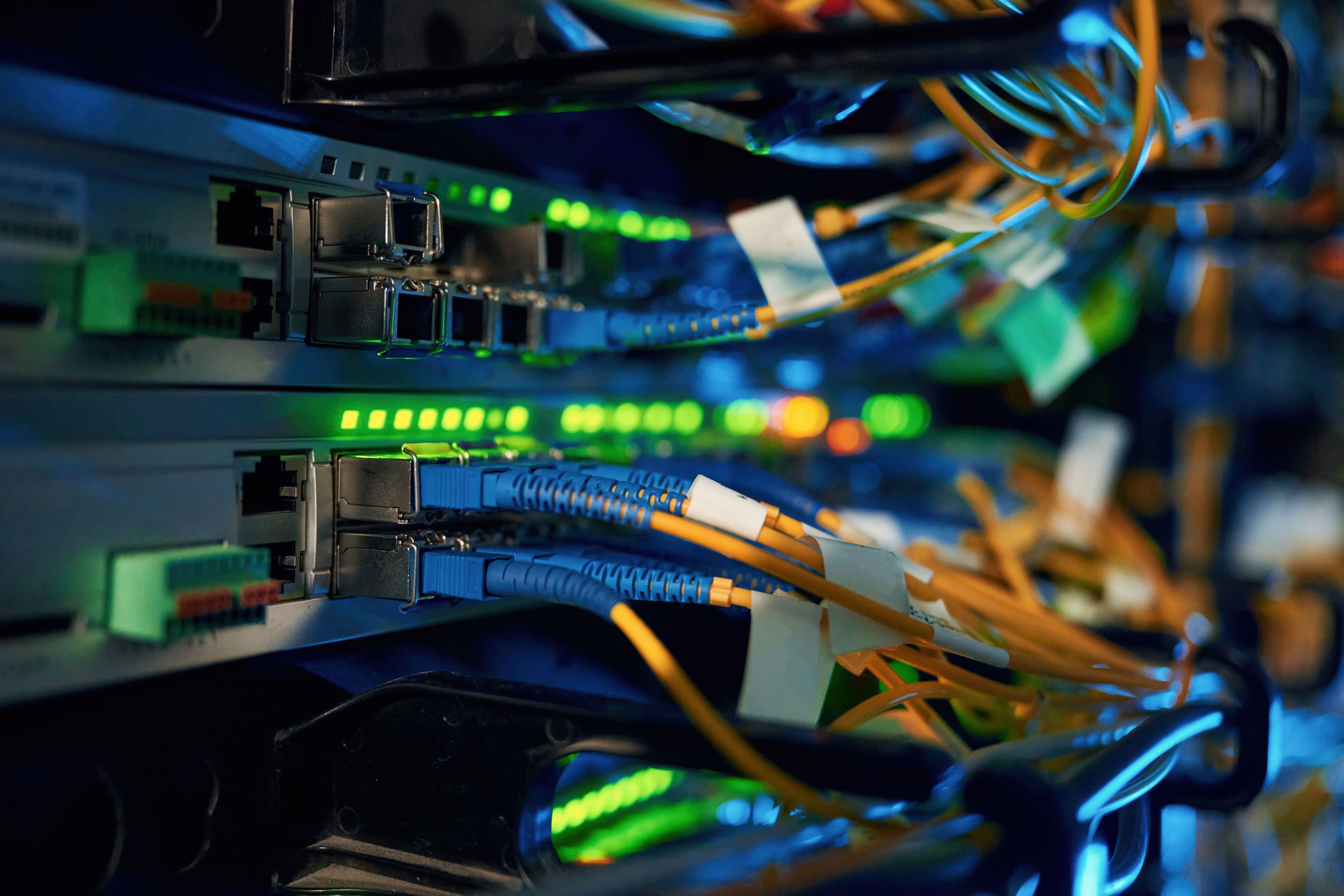Blue and yellow wires. Close up view of hardware in the server room