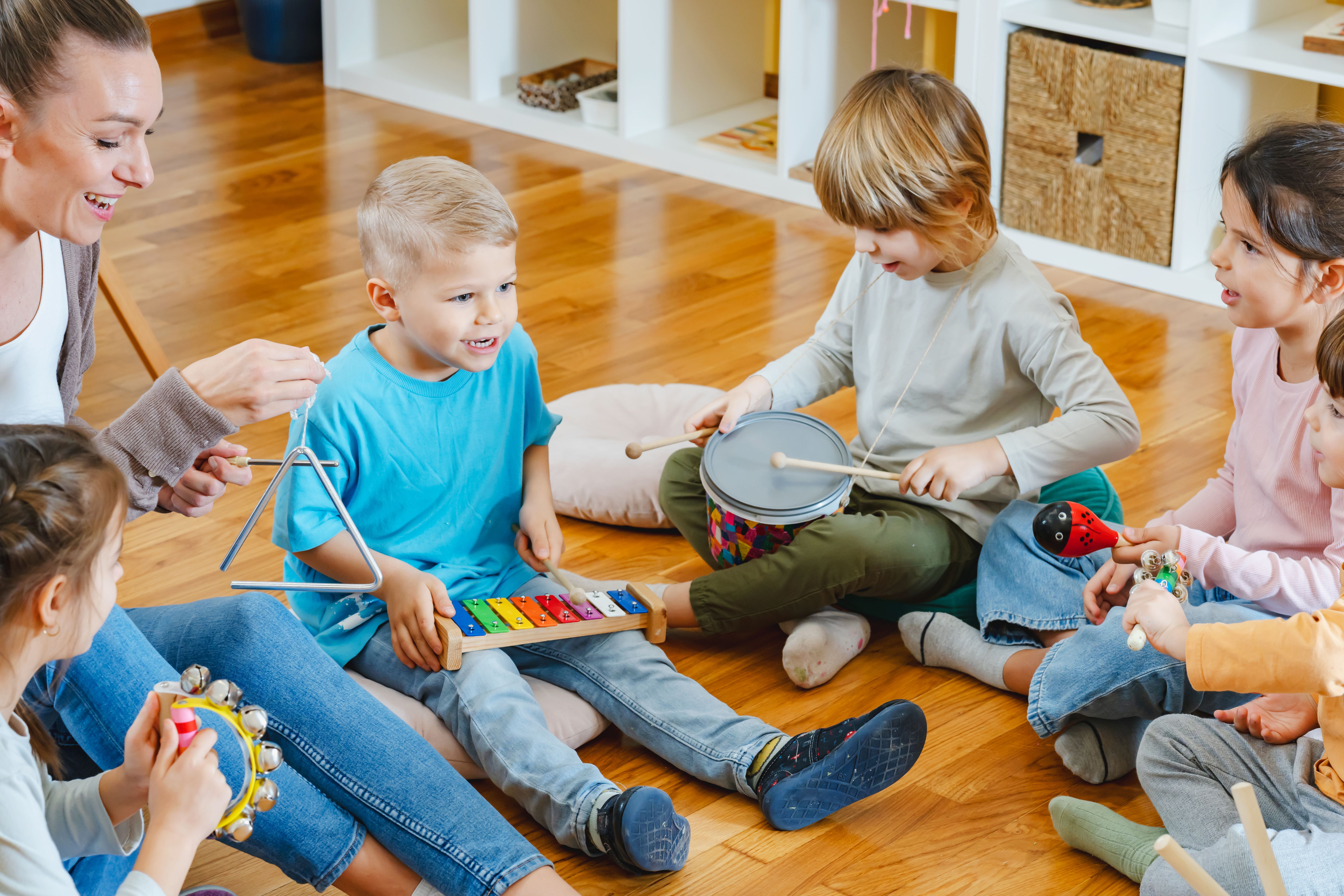 children playing music