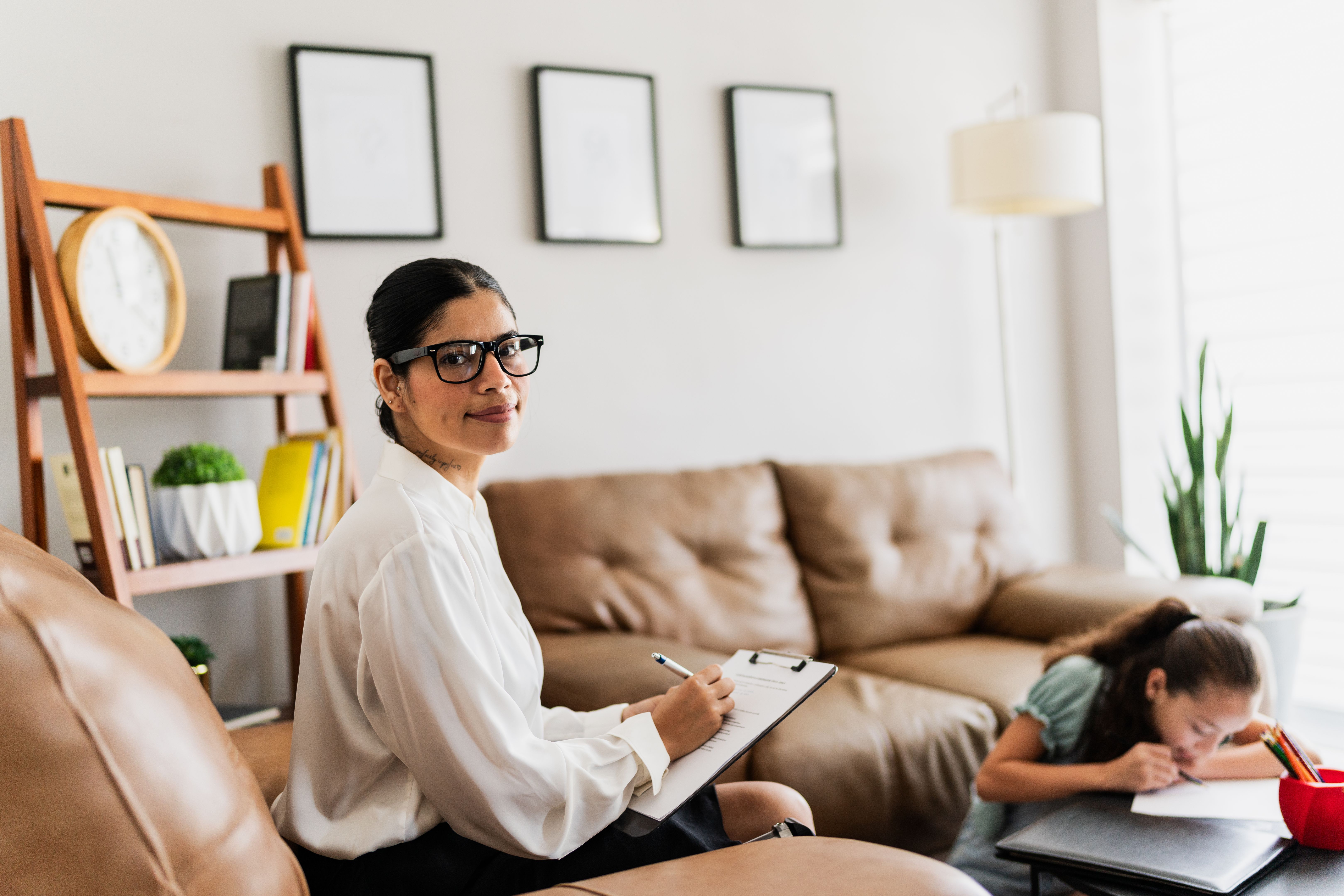 child with therapist