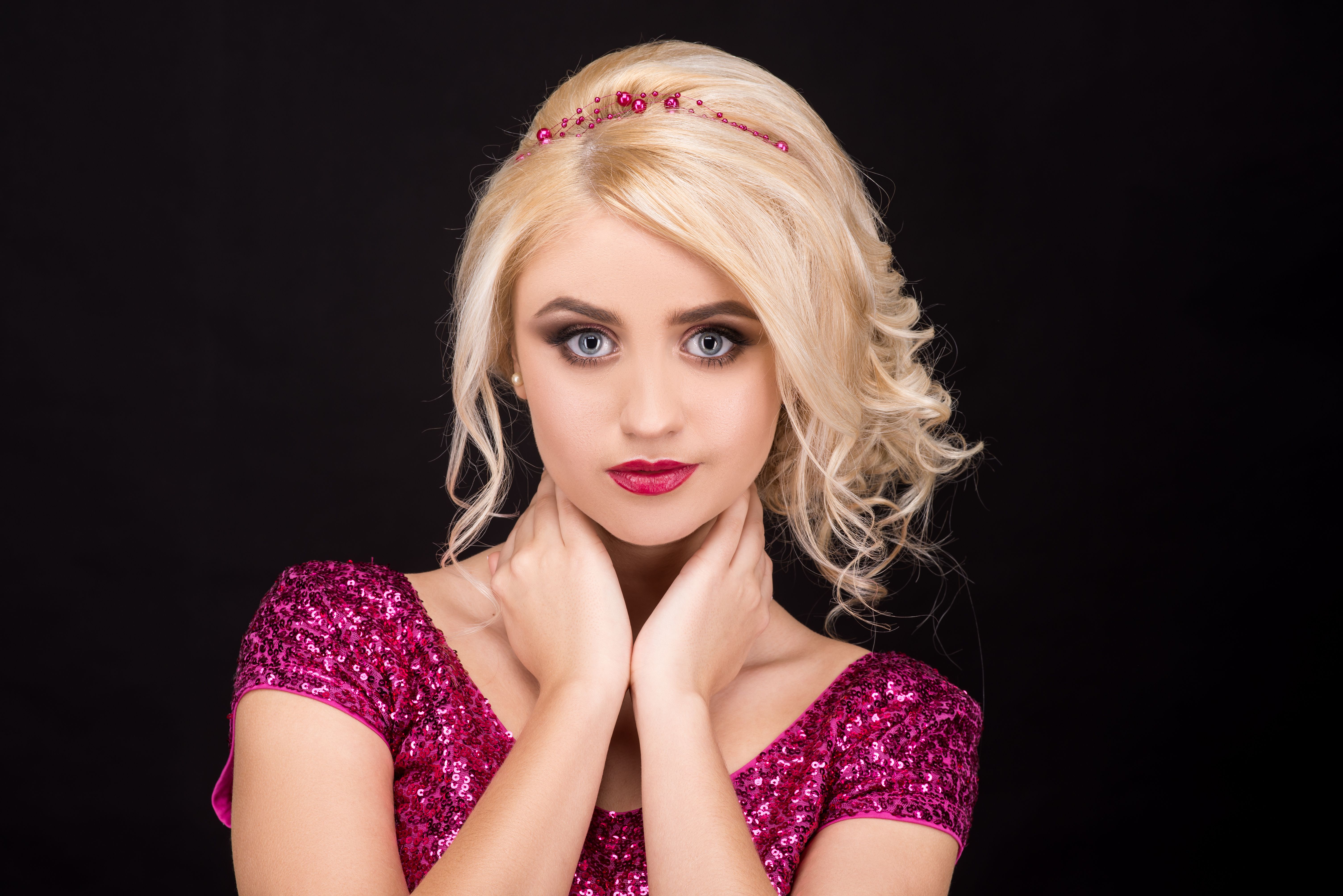 beautiful young girl on black background