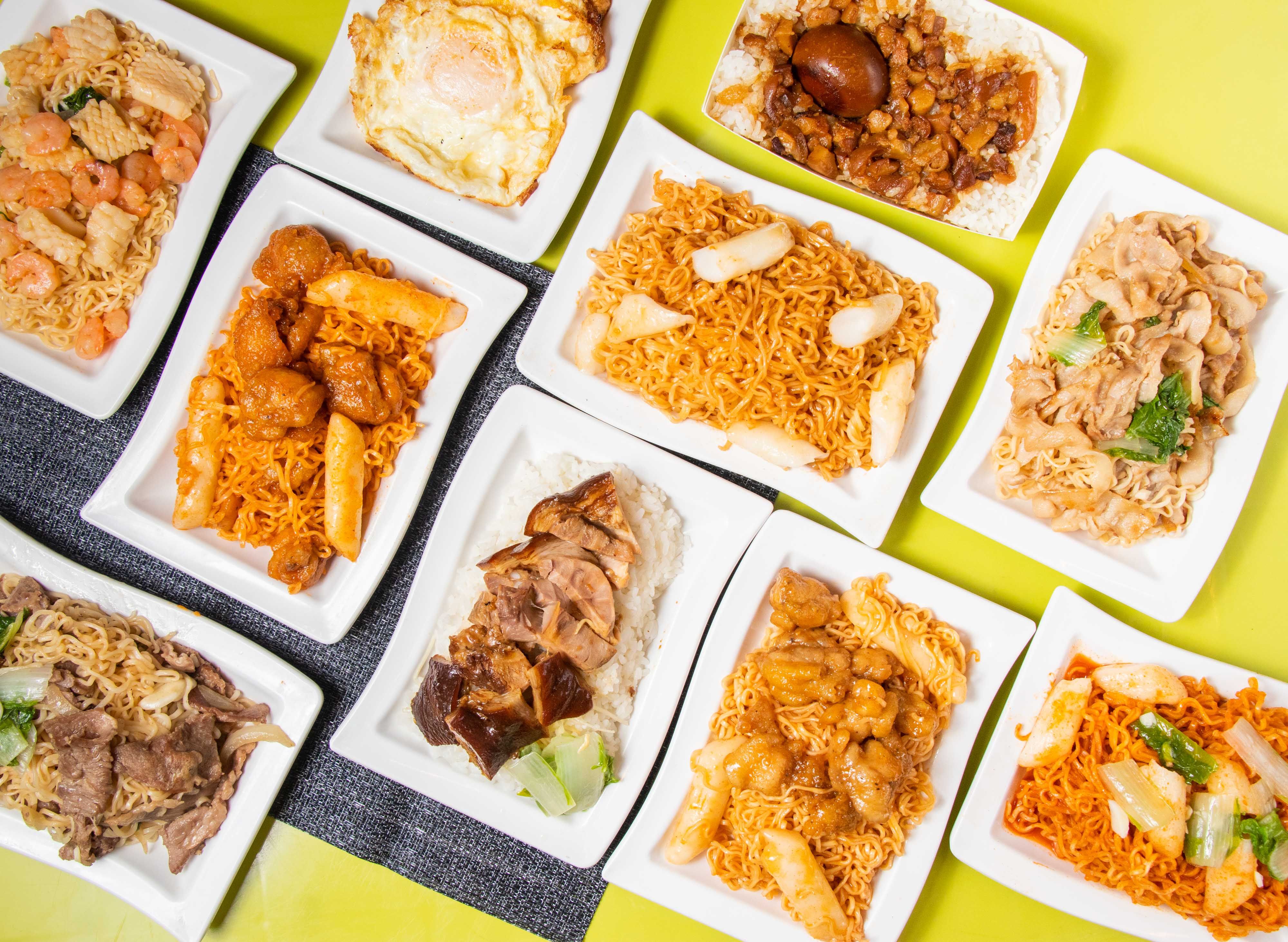 Assorted Stir-fried Instant Noodles with pork, beef, shrimp, Korean Cheese Fried Chicken, Braised Rice with Pork and Soy Sauce, pilaf and polao served in bowl isolated on table top view of taiwan food Assorted Stir-fried Instant Noodles with pork, beef, shrimp, Korean Cheese Fried Chicken, Braised Rice with Pork and Soy Sauce, pilaf and polao served in bowl isolated on table top view of taiwan food