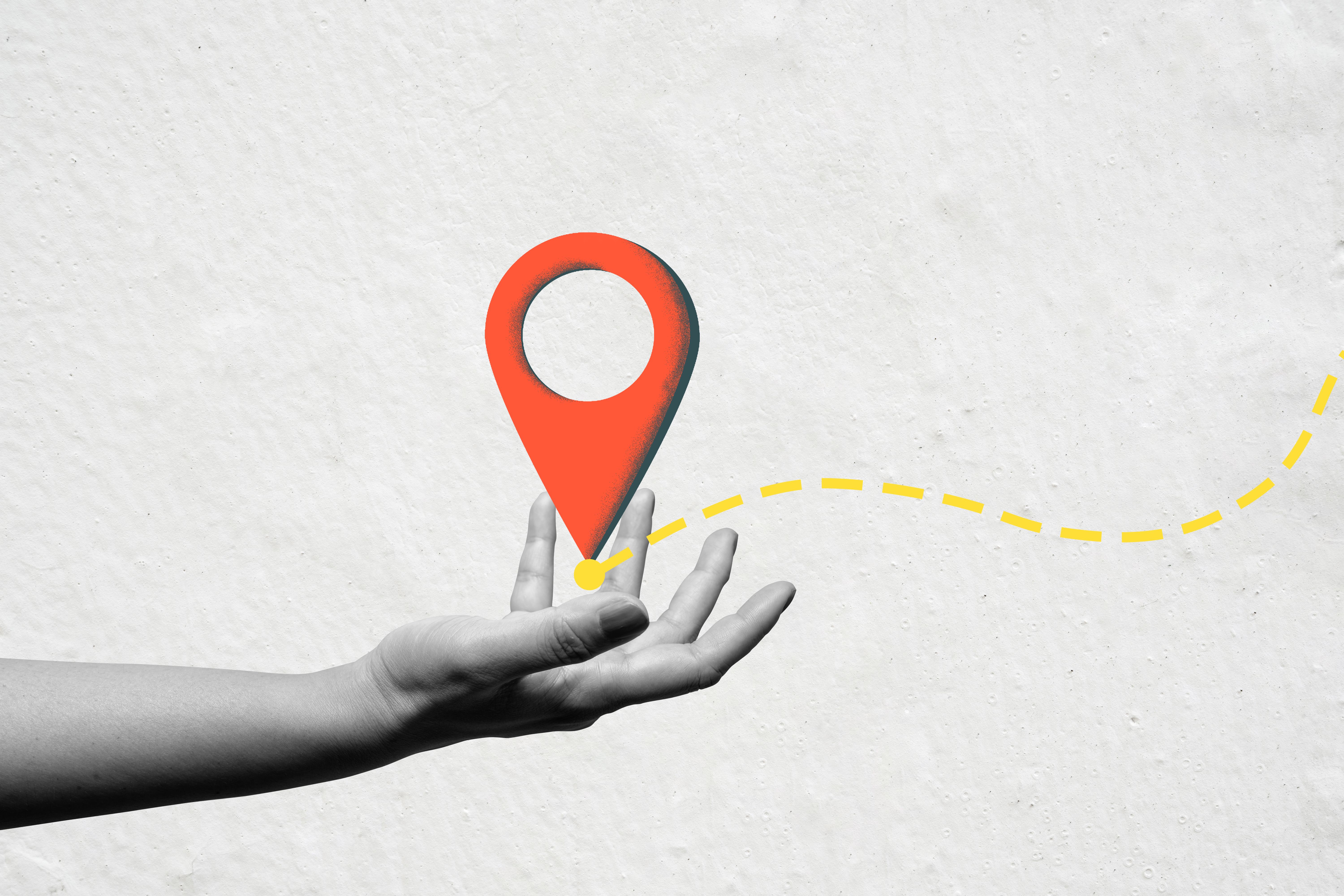 Human hand showing a location map pin. Concept of travel. Collage art Human hand showing a location map pin. Concept of travel. Collage art