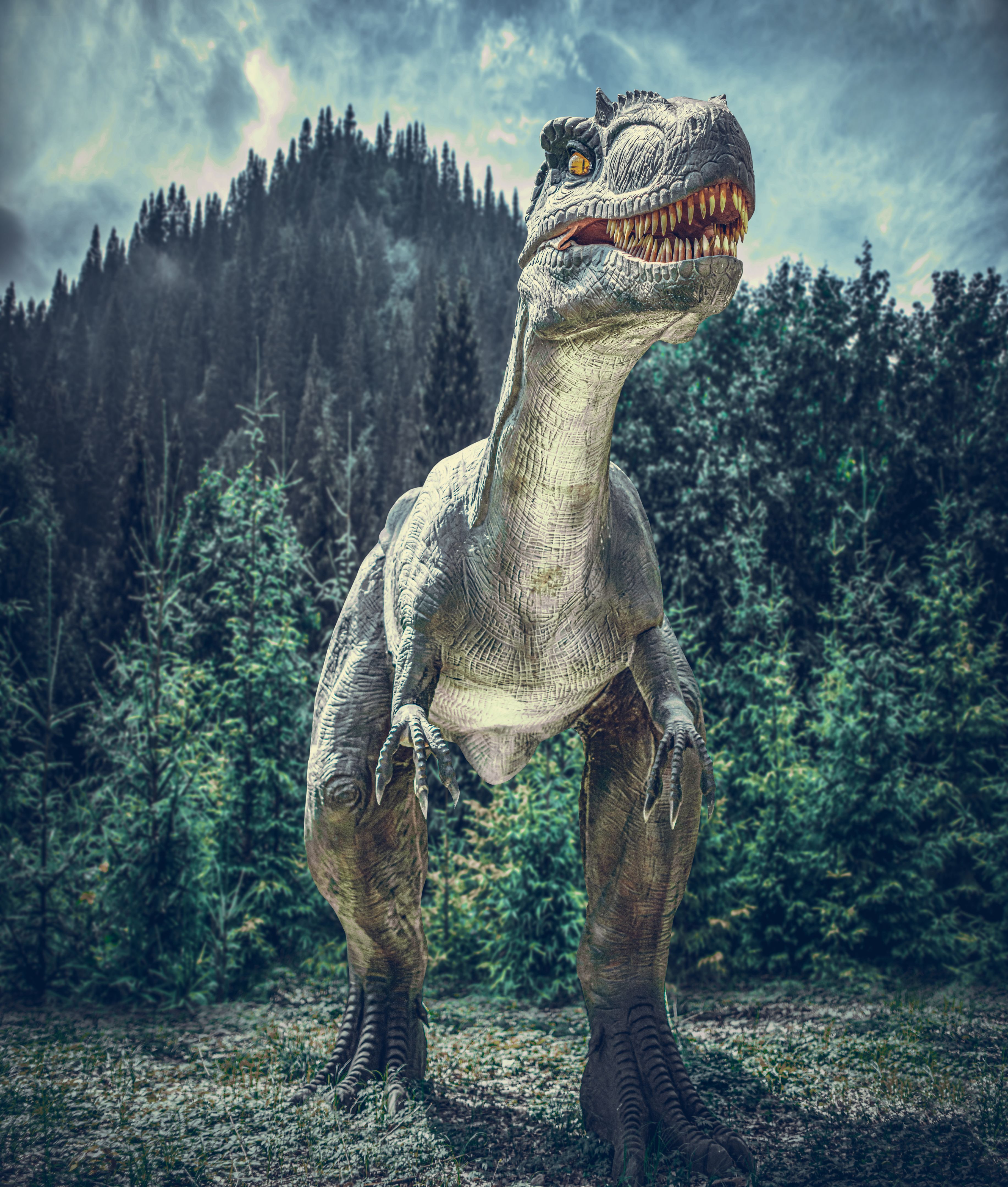 Dinosaur on the background of a forest.