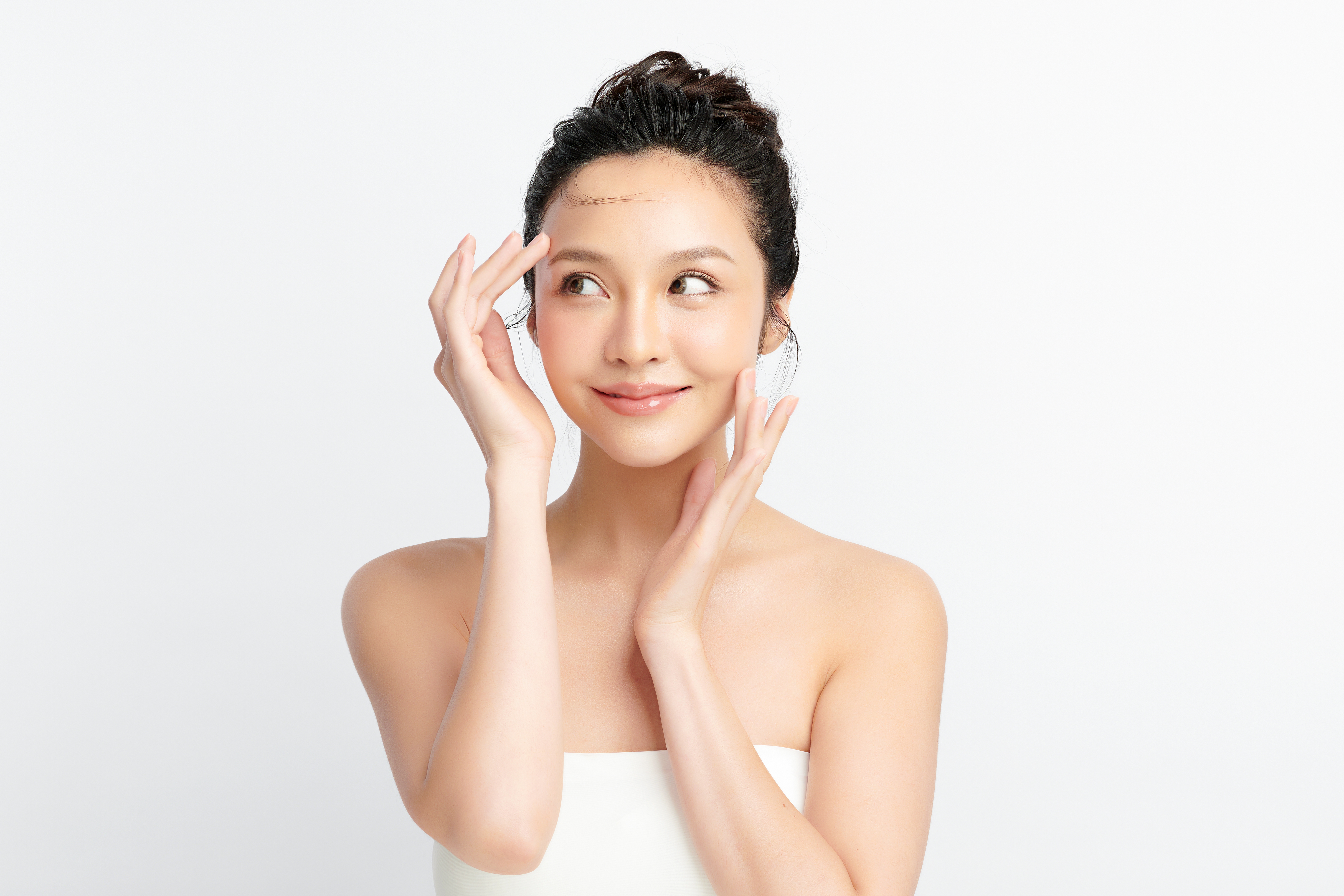 Beautiful young asian woman with clean fresh skin on white background, Face care, Facial treatment, Cosmetology, beauty and spa, Asian women portrait.