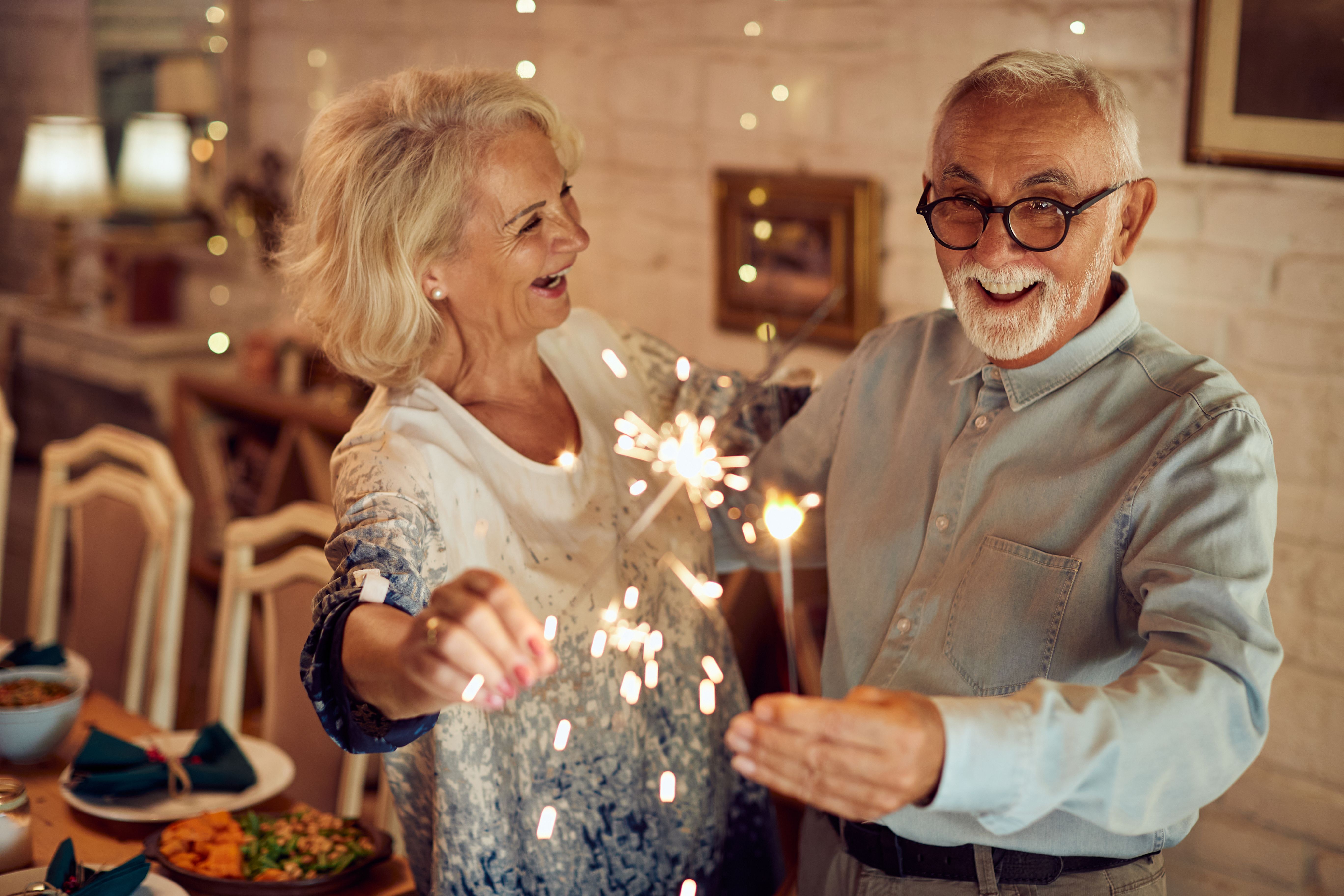 elderly couple celebrating