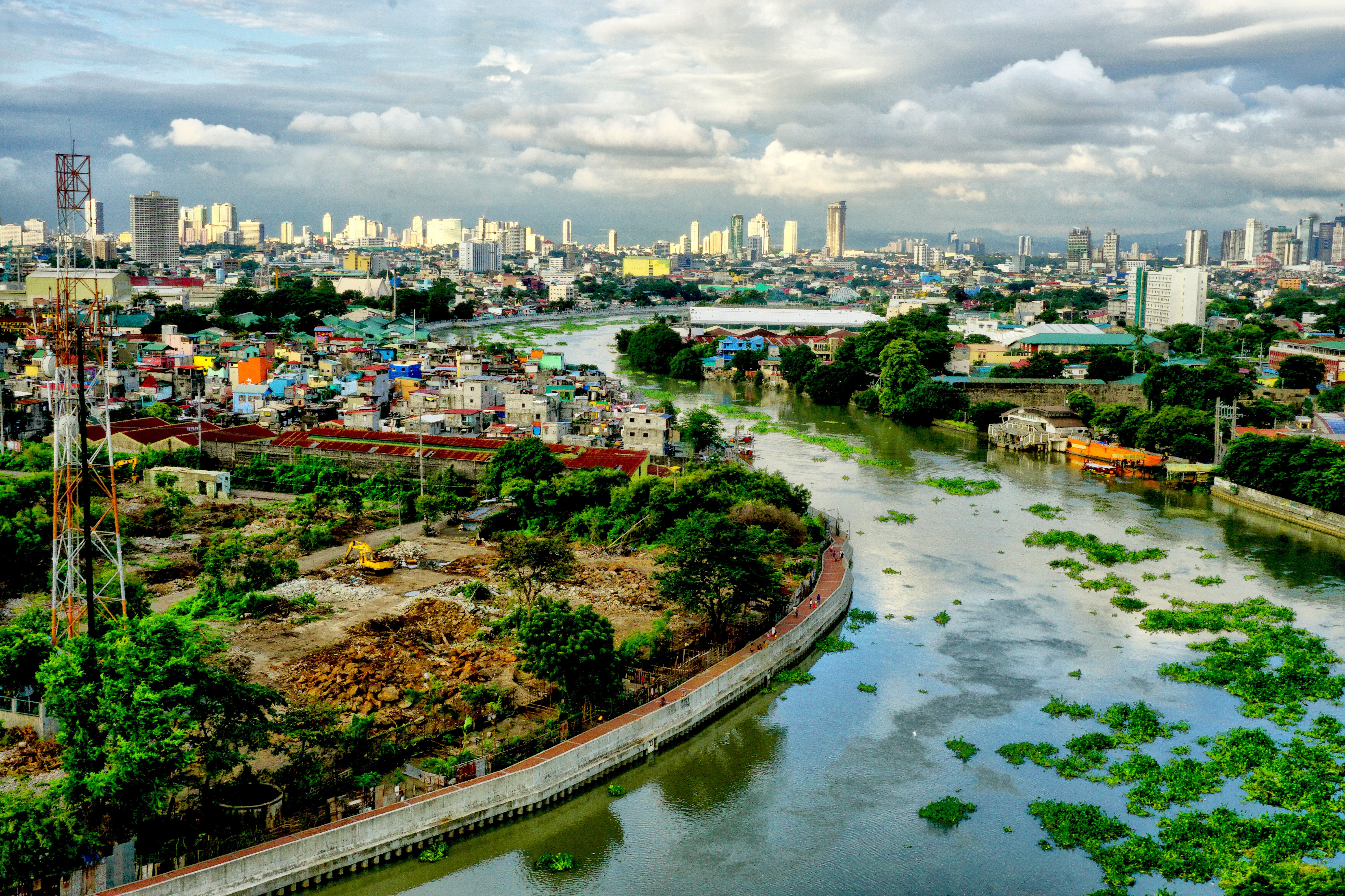 High Angle View Of River Amidst Buildings In City
