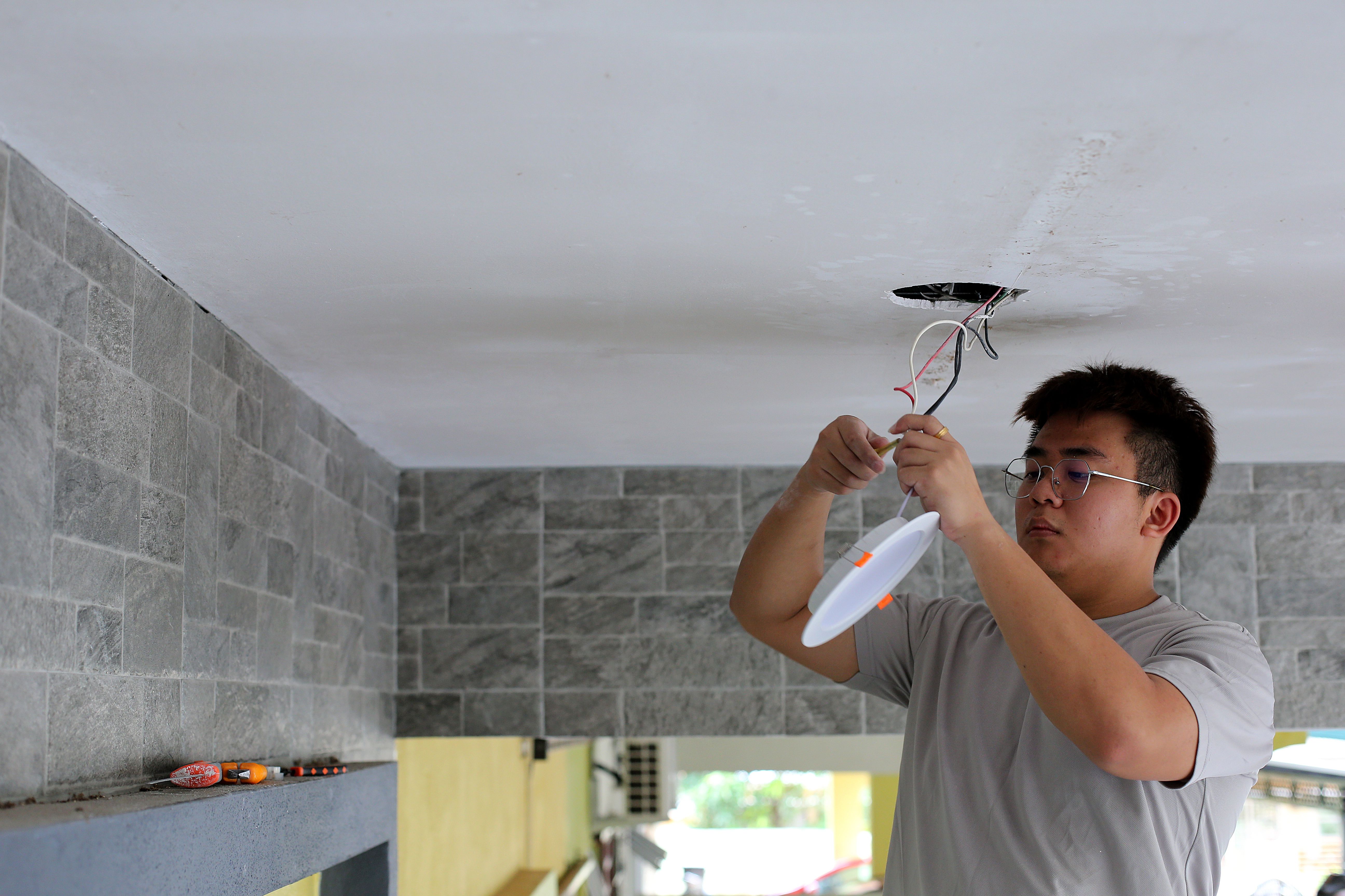 installing light fixture