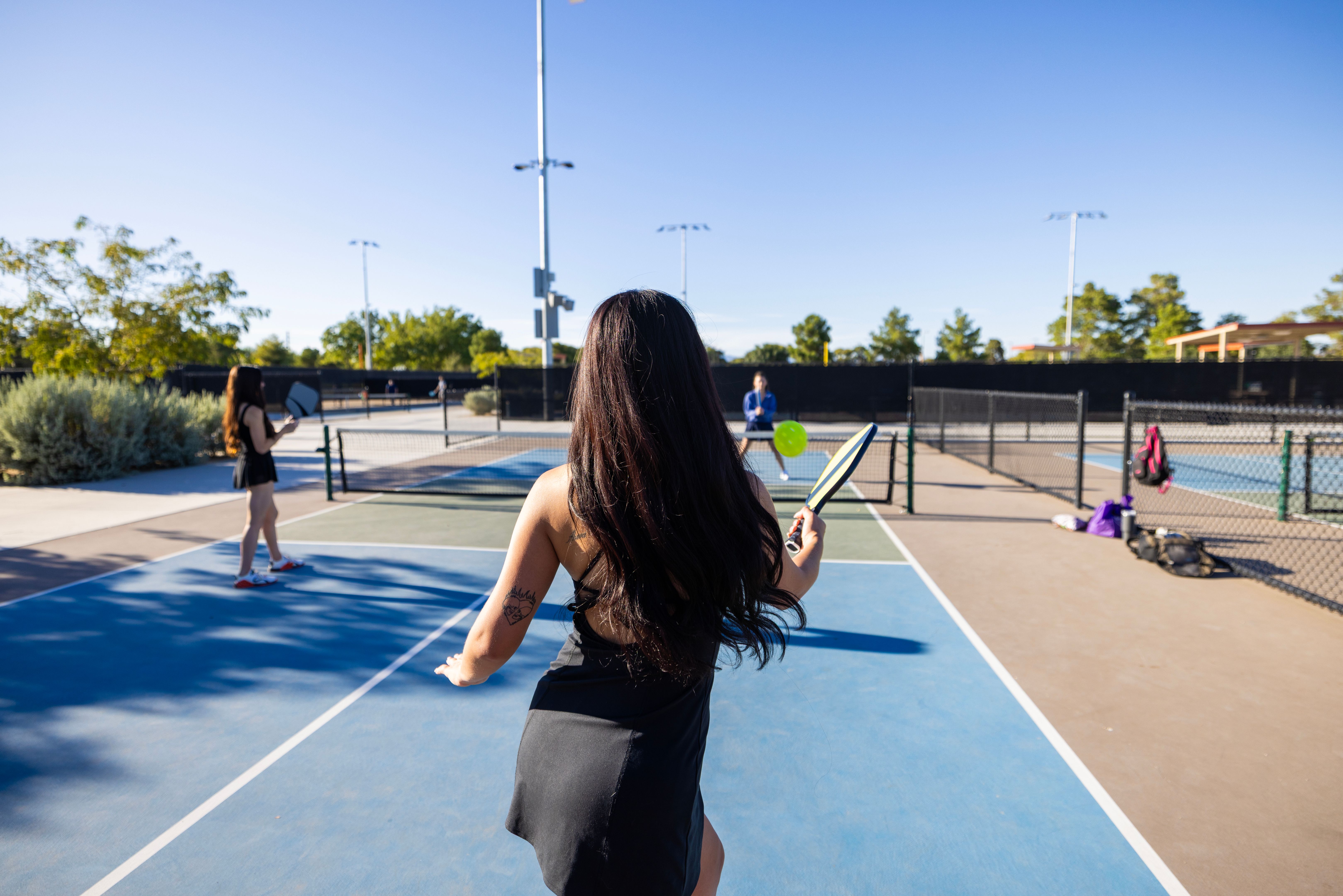 kids playing pickleball