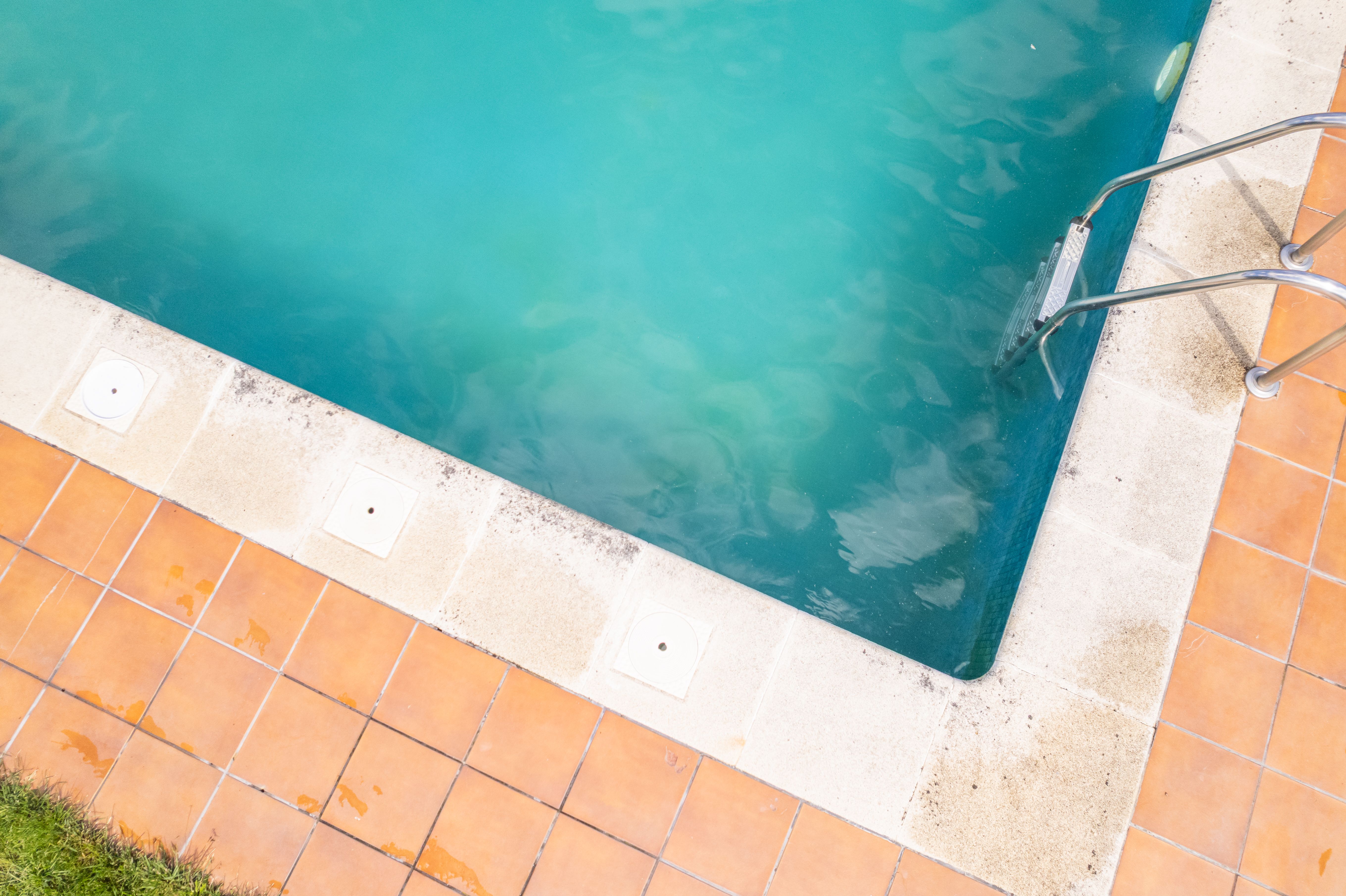Abstract Summer Background, Refreshing Water Texture in a Pool with Copy Space, aerial drone top down view