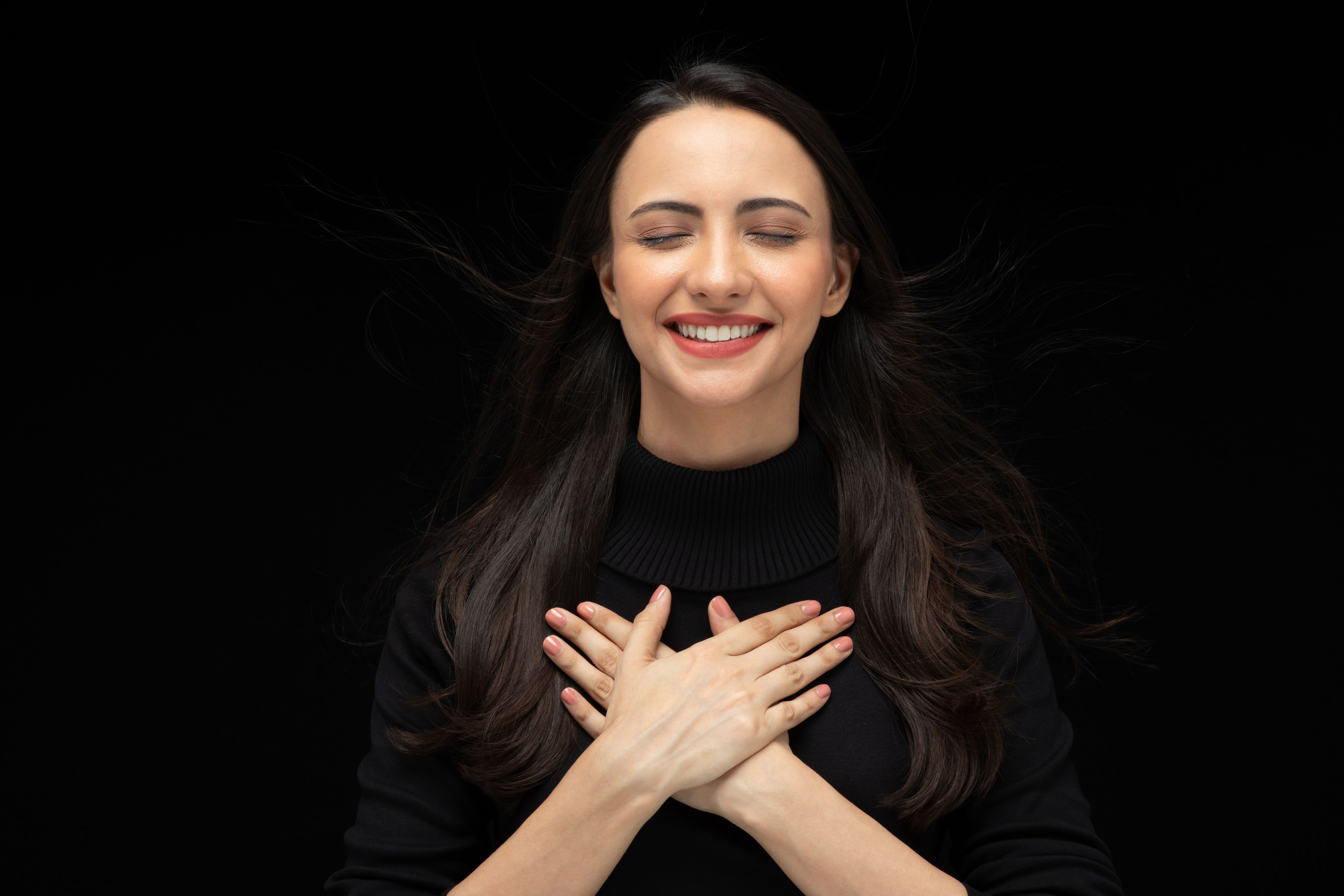Photo of beautiful amazed girl wearing casual black t-shirt isolated black background stock photo Photo of beautiful amazed girl wearing casual black t-shirt isolated black background stock photo