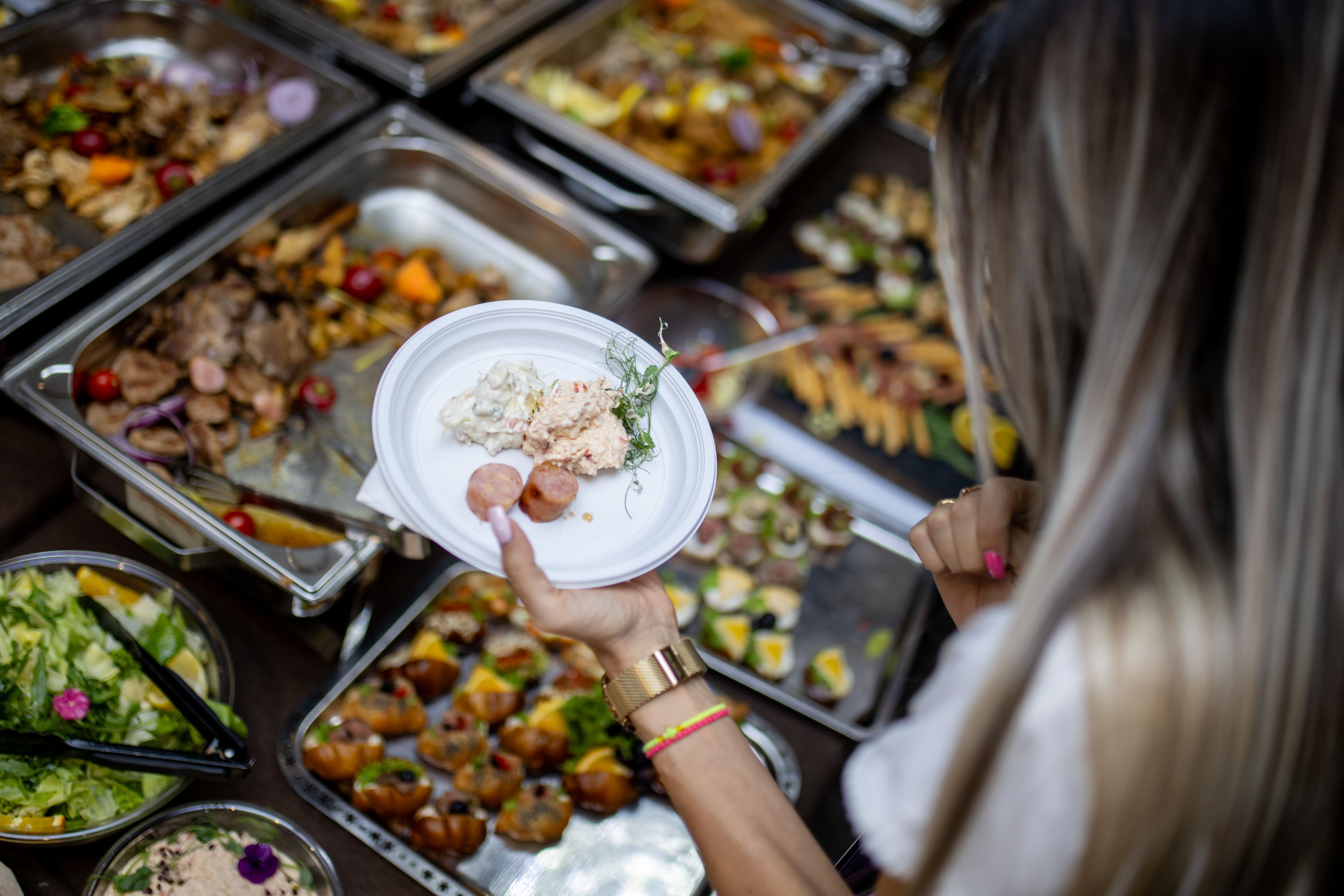Food tasting event featuring a variety of dishes and colorful presentations on display at a local venue Food tasting event featuring a variety of dishes and colorful presentations on display at a local venue