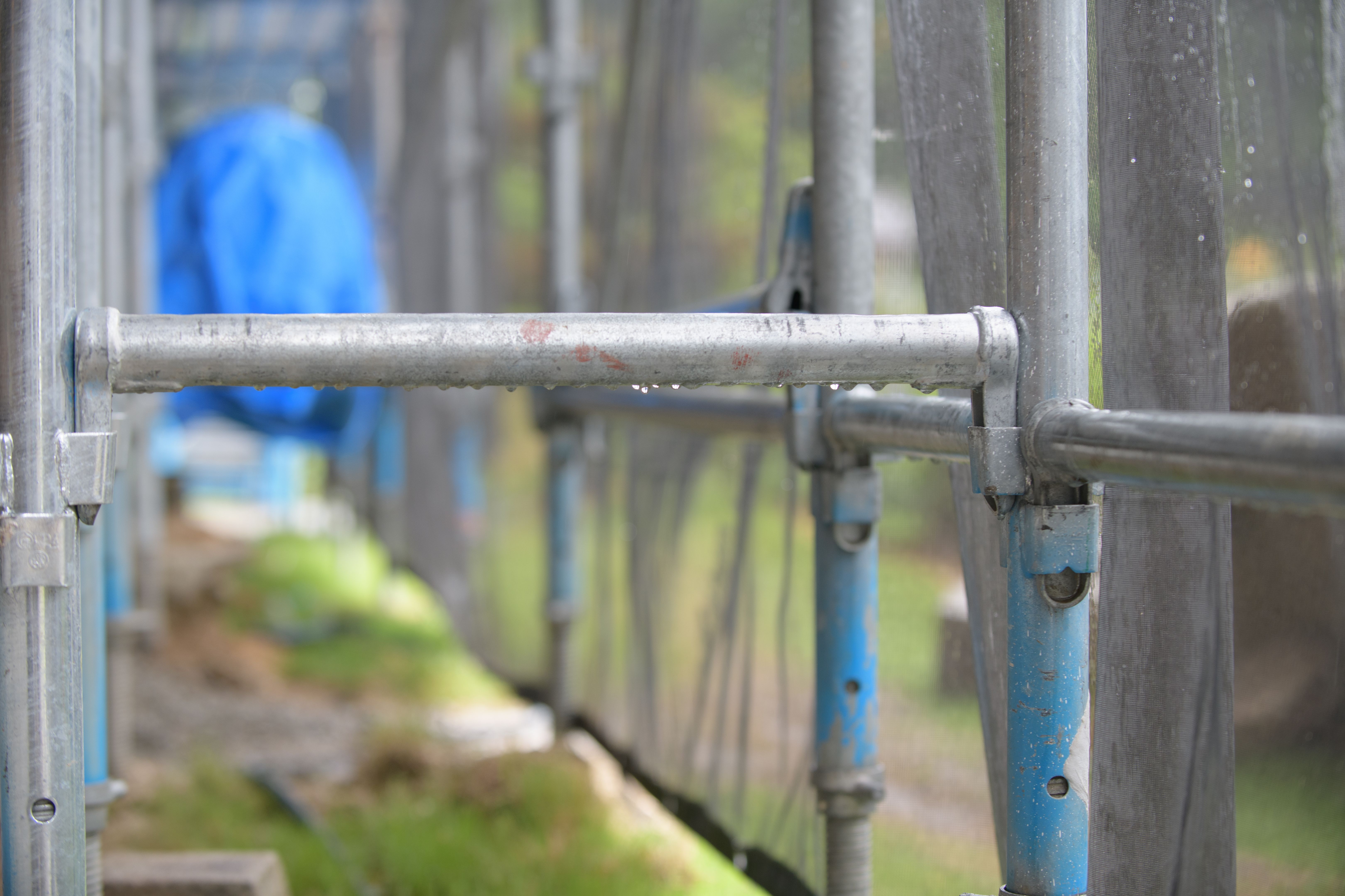 Rain-soaked scaffolding at a construction site