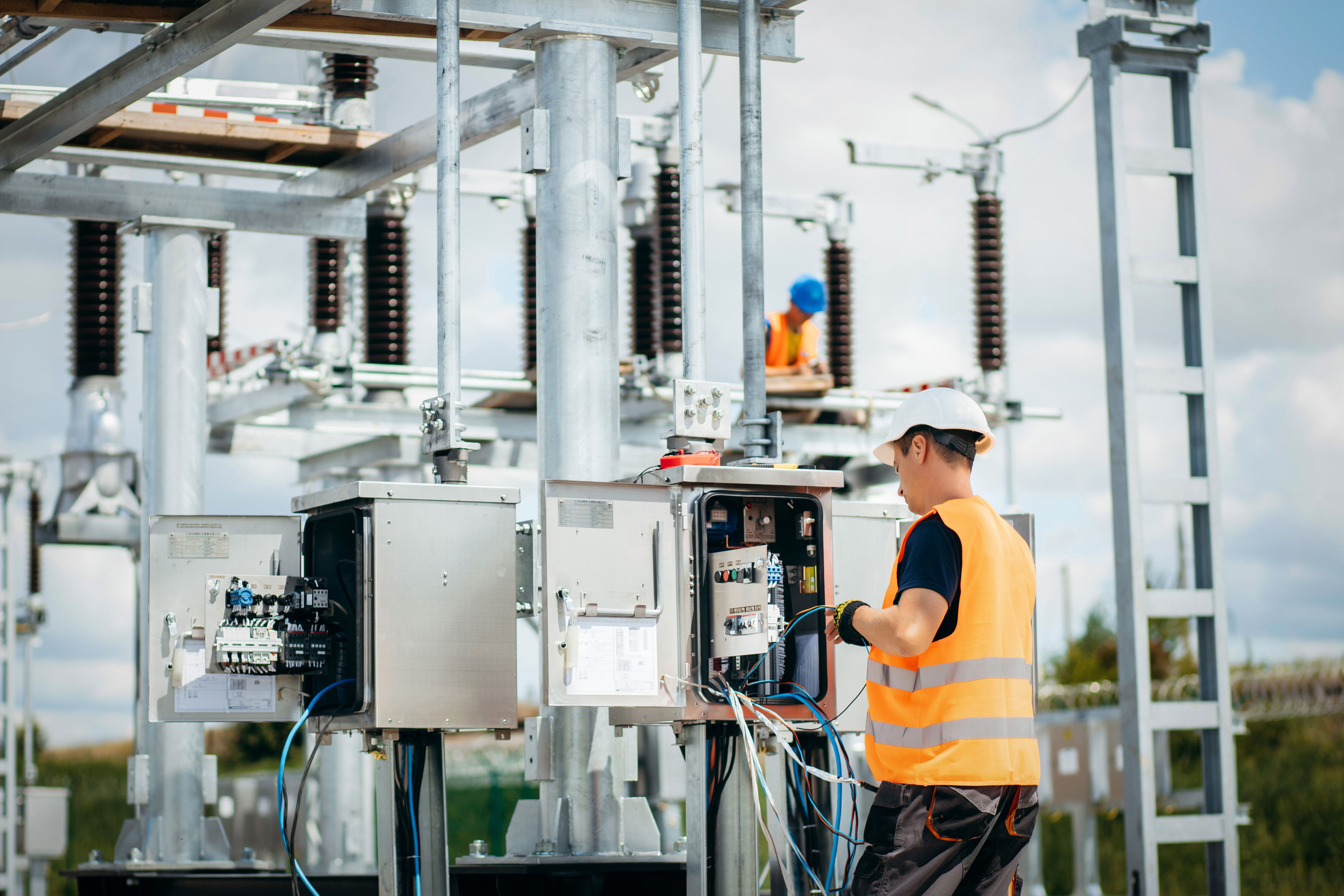 technician inspecting transformer