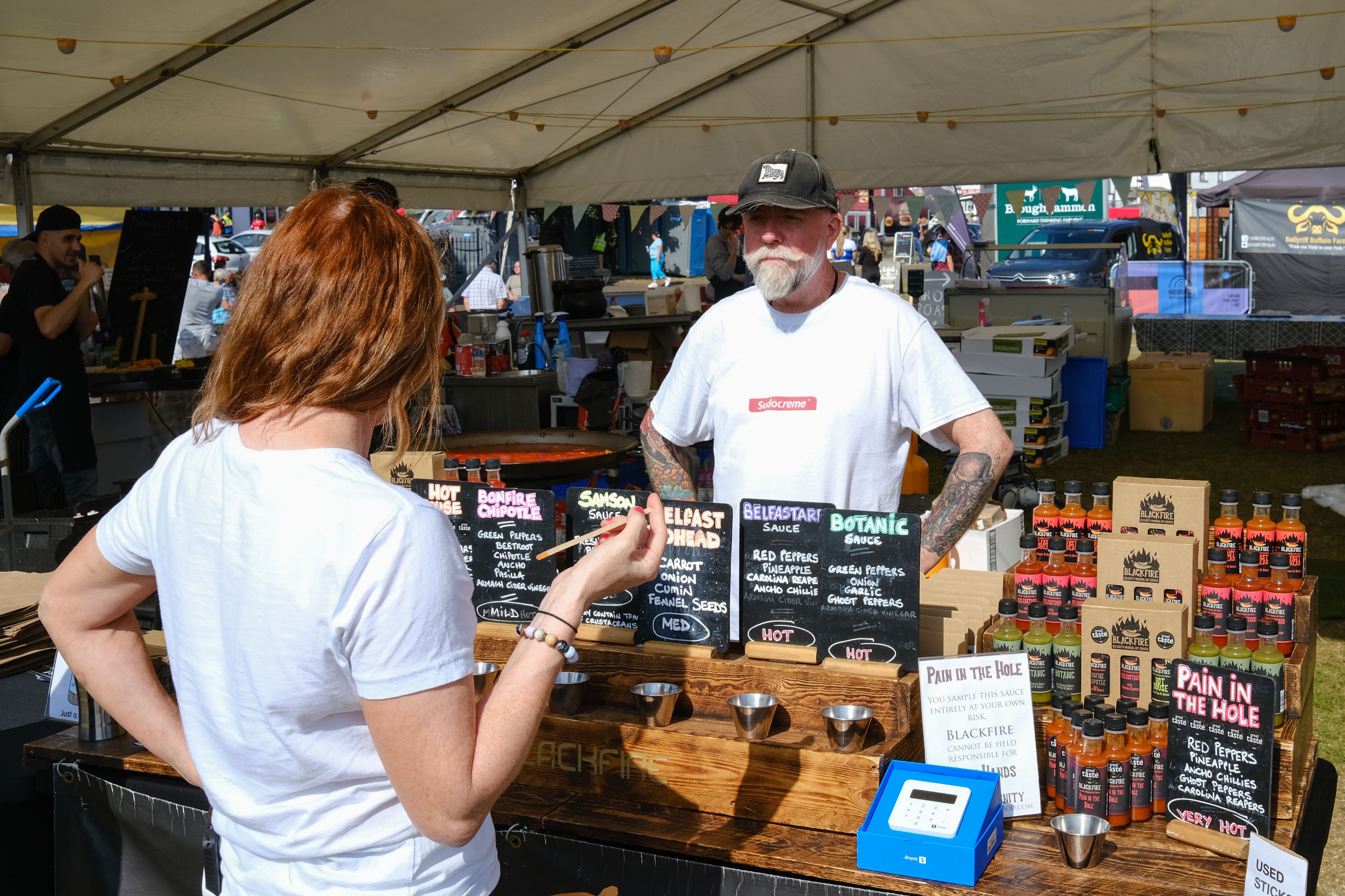 Stall holder selling hot sauce