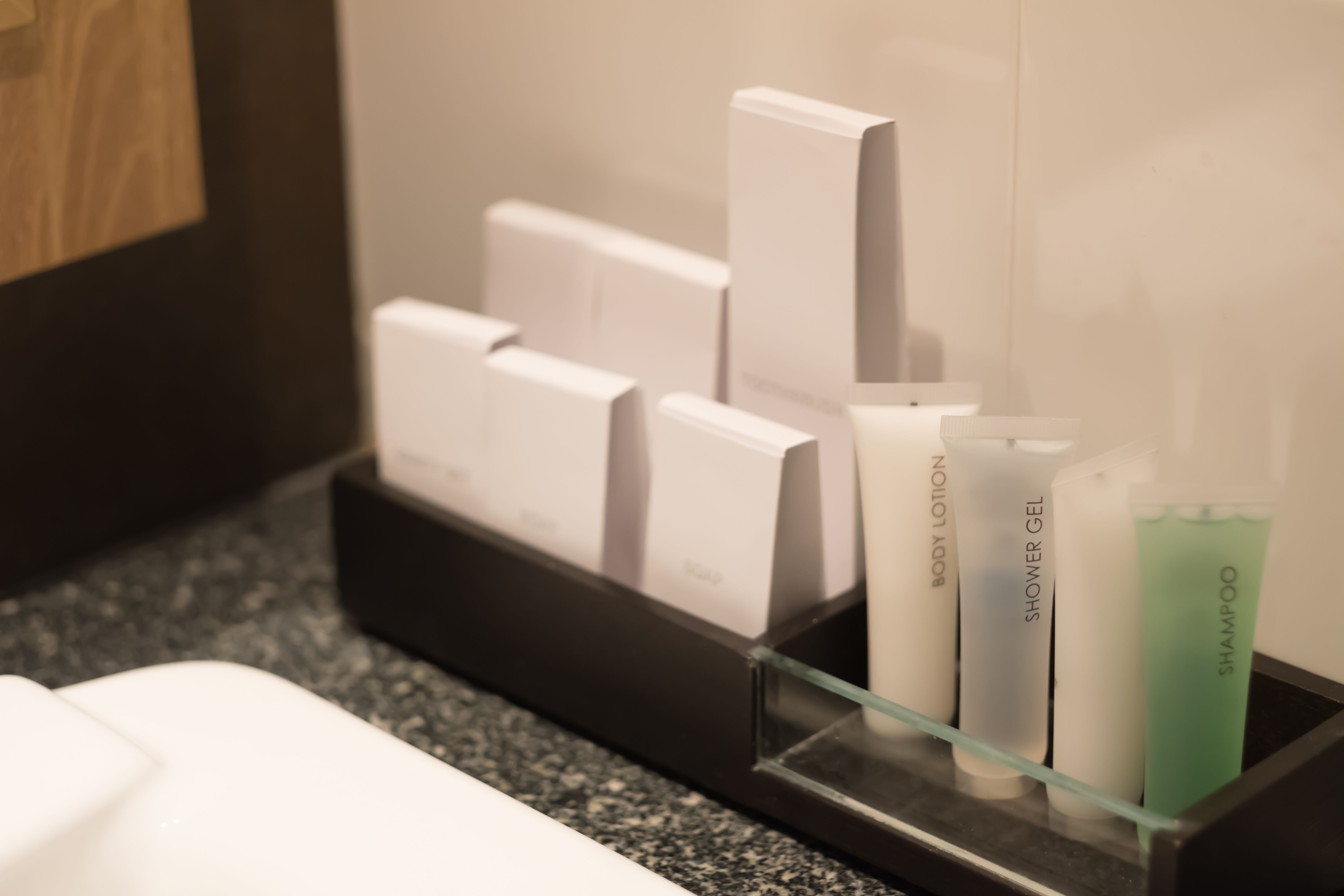 Bath set : shampoo, conditioner, lotion in a luxury hotel suite bathroom