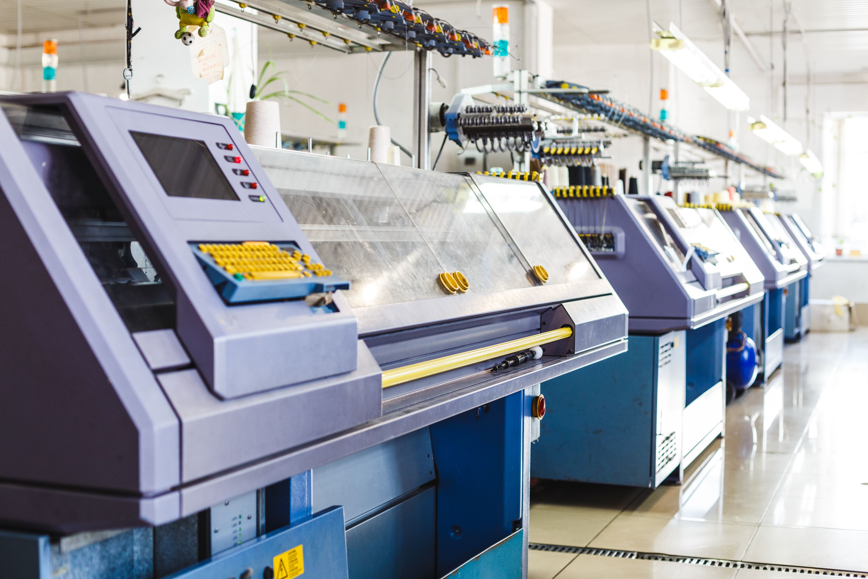 Textile industry with knitting machines in factory