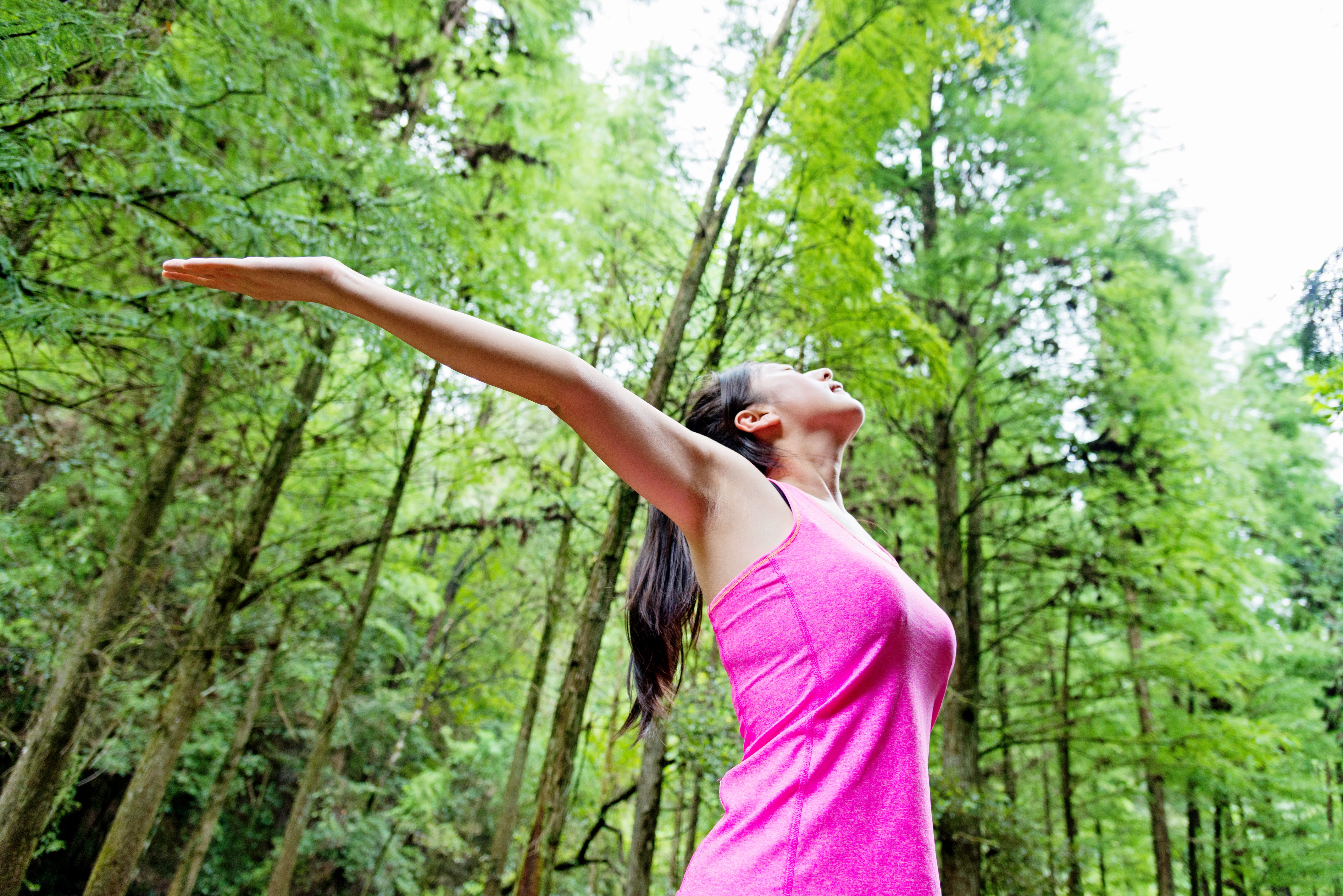 Asian woman enjoying fresh air Asian woman enjoying fresh air