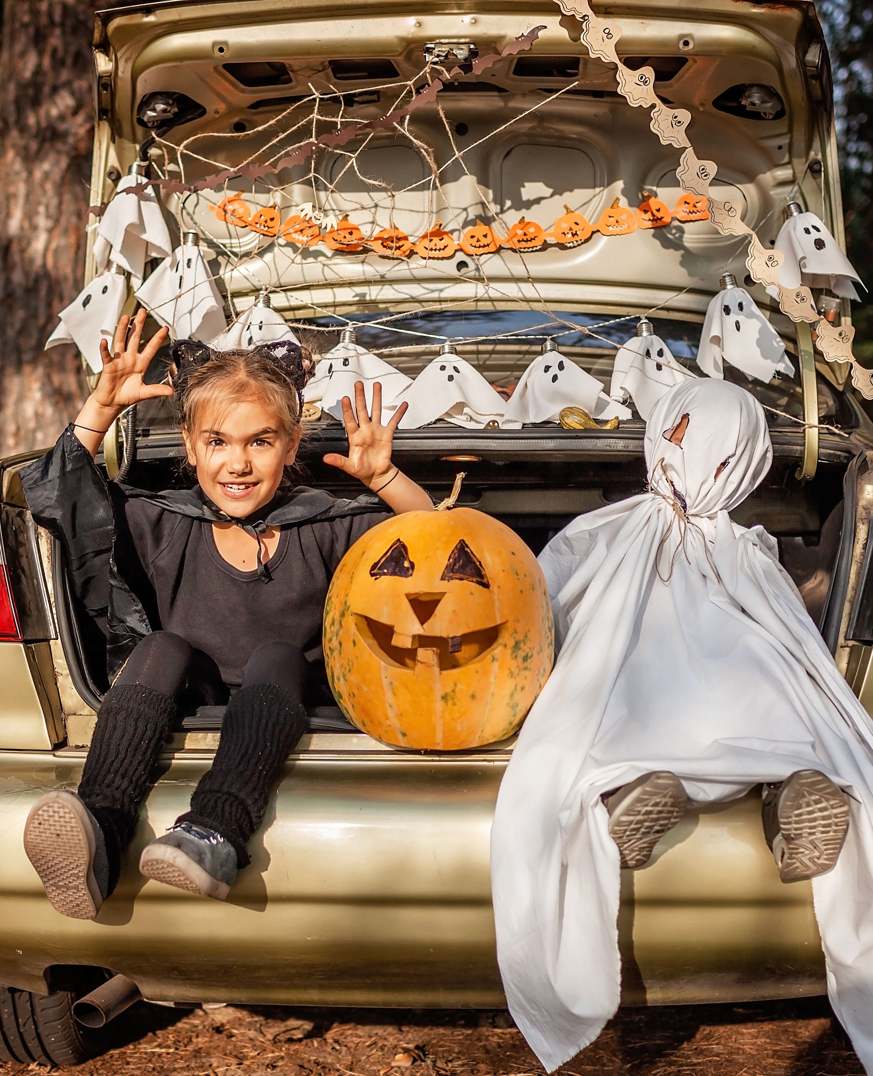 Trunk or Treat Halloween celebration gains popularity in North Phoenix townhome garages. Backs of SUV's, pickups, car trunks, even entire garages are decorated for Halloween trick or treaters. 
