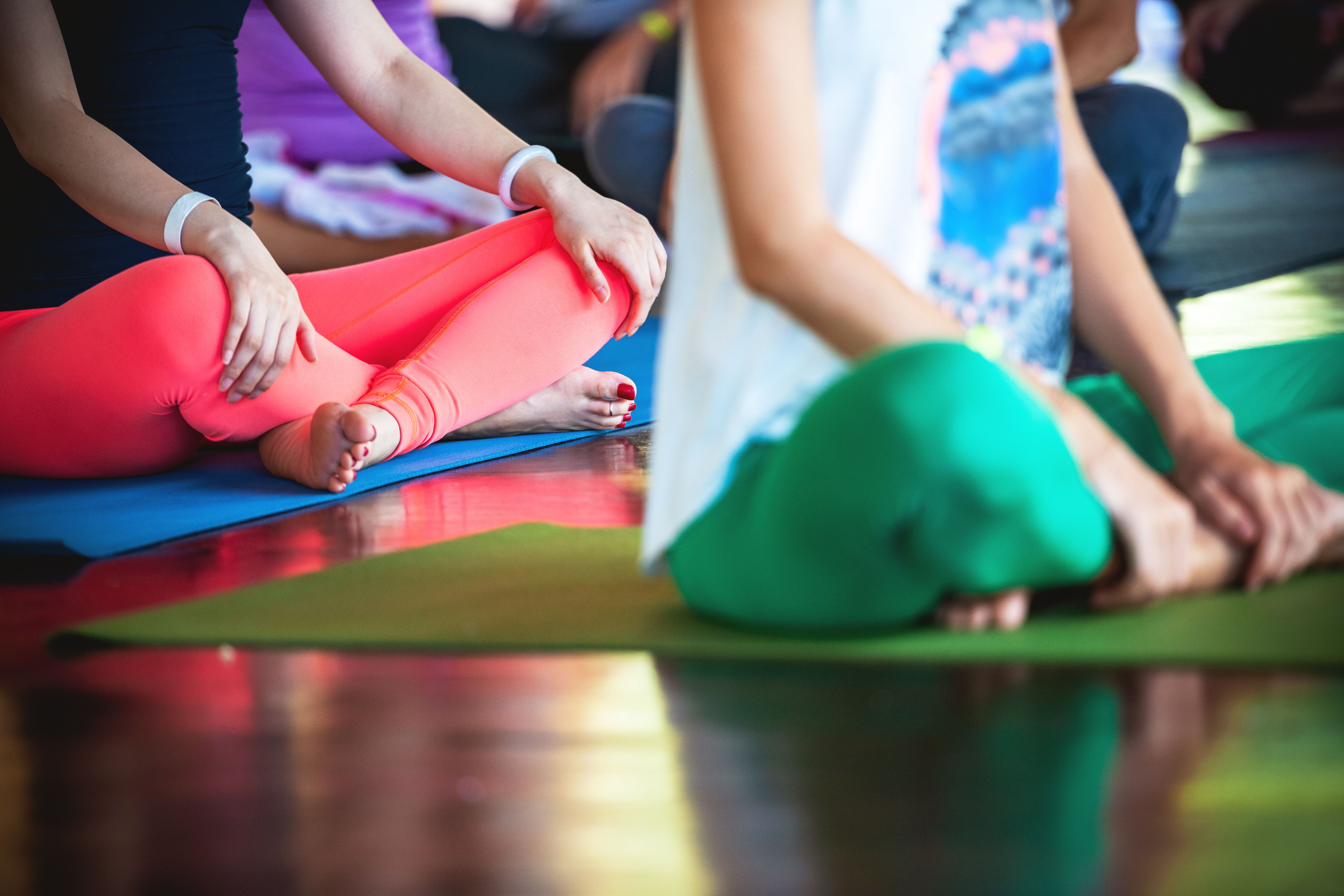 Group of female practicing yoga