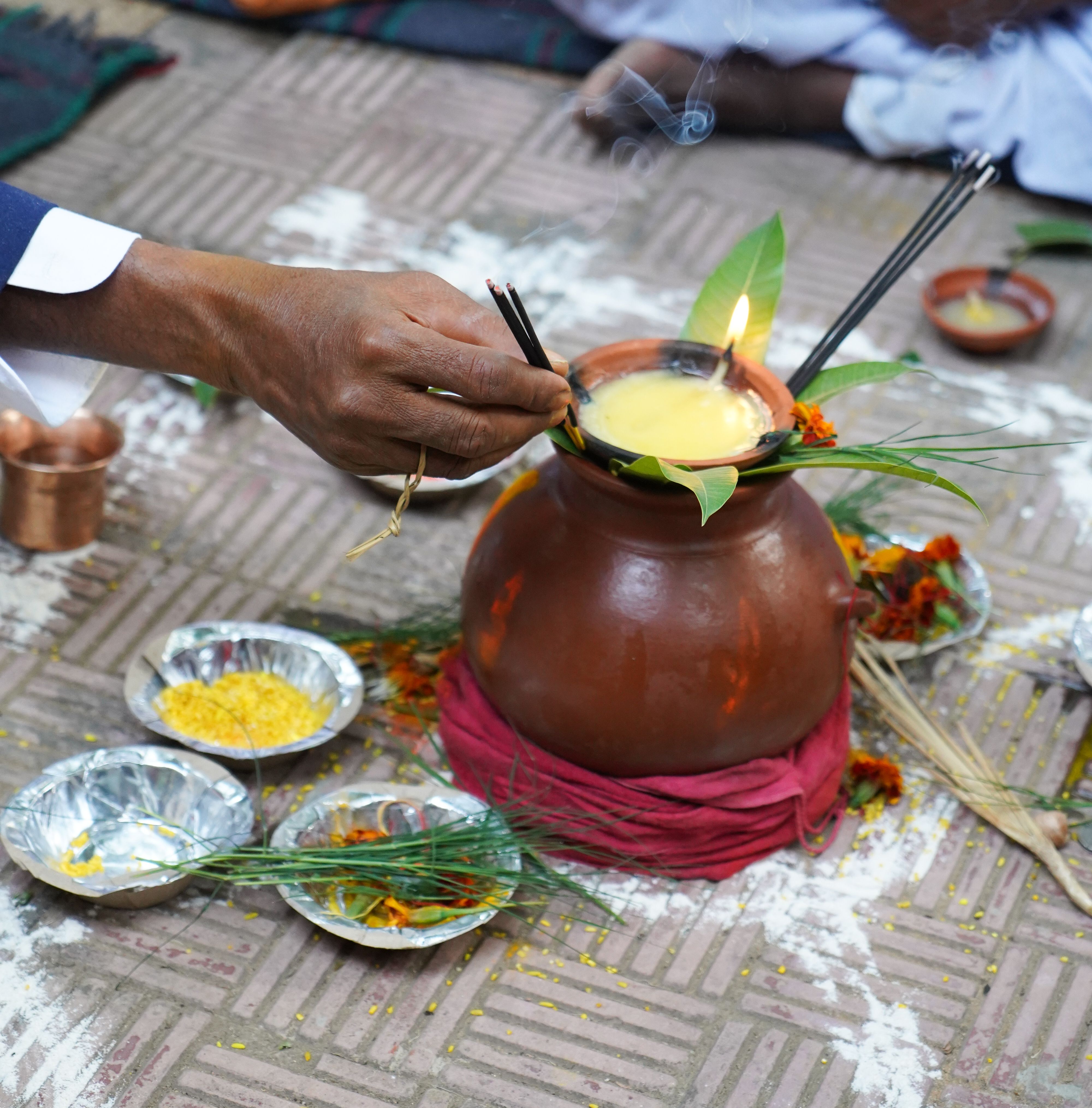 Indian groom father offering prayer during marriage. Indian groom father offering prayer during marriage.