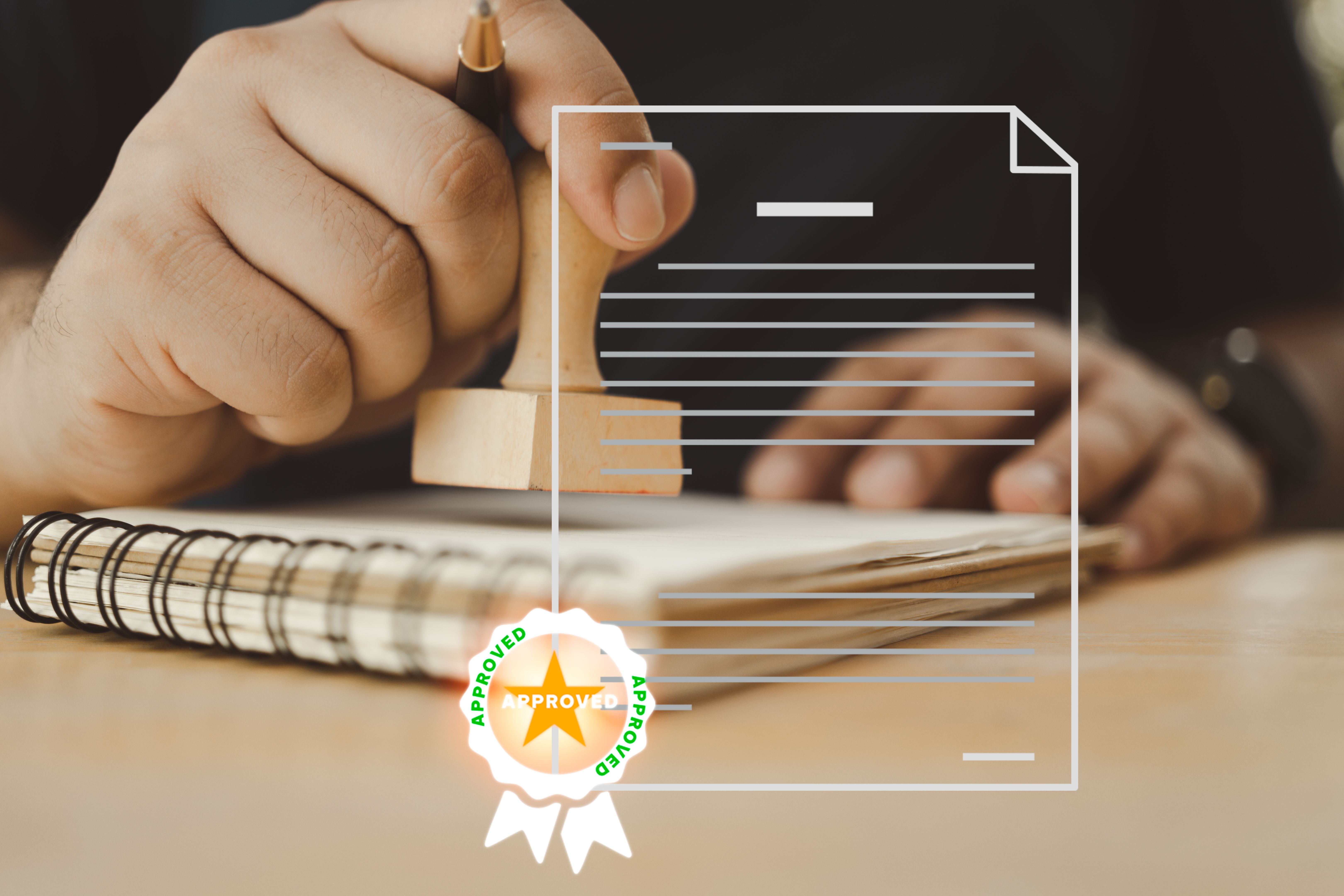 Business approved concept. Officer hand stamping with approved stamp on certificate paper