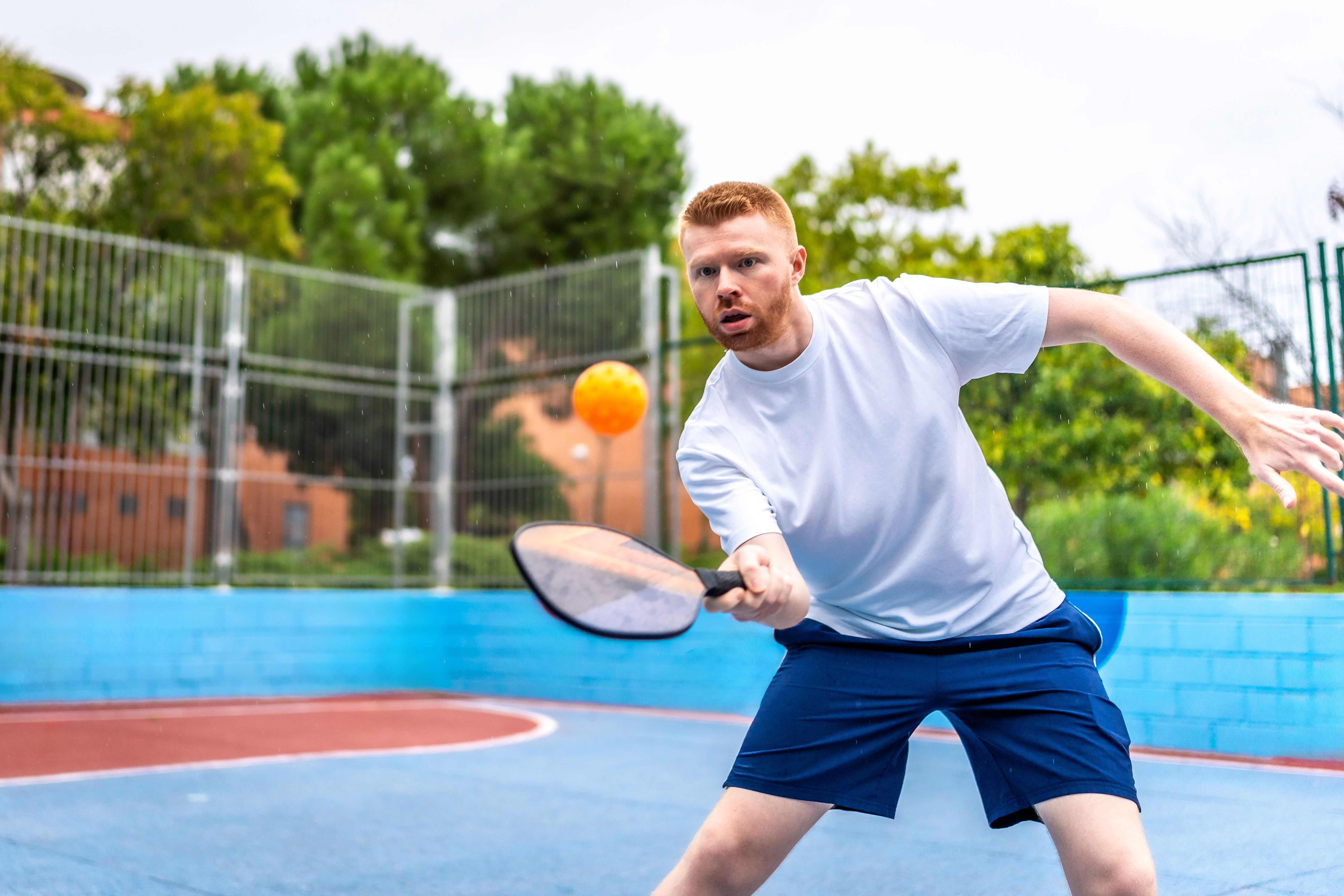 group playing pickleball
