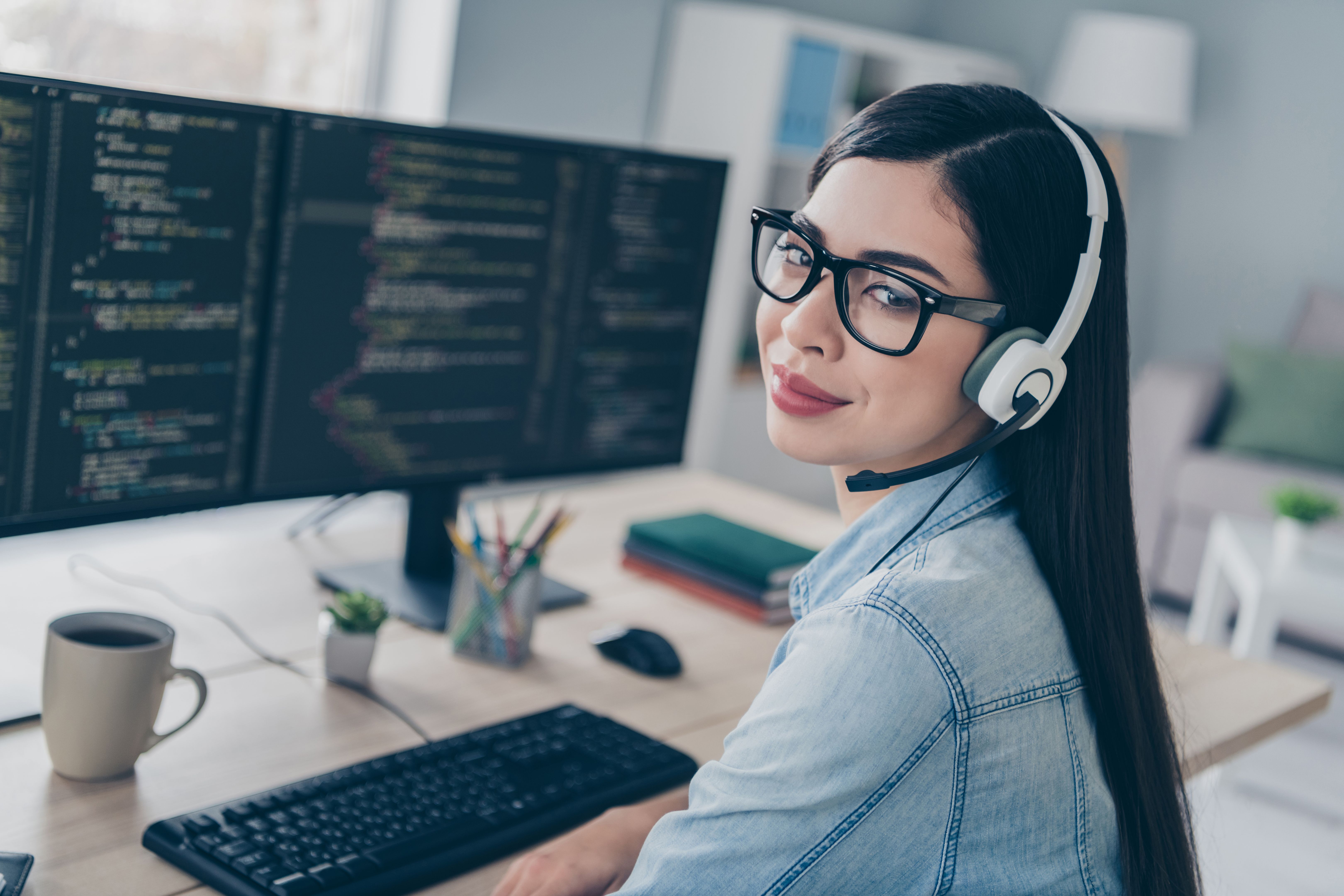 Photo of lady freelancer headphones sit desk speak server hacker connection protection sit desk in modern workplace workstation