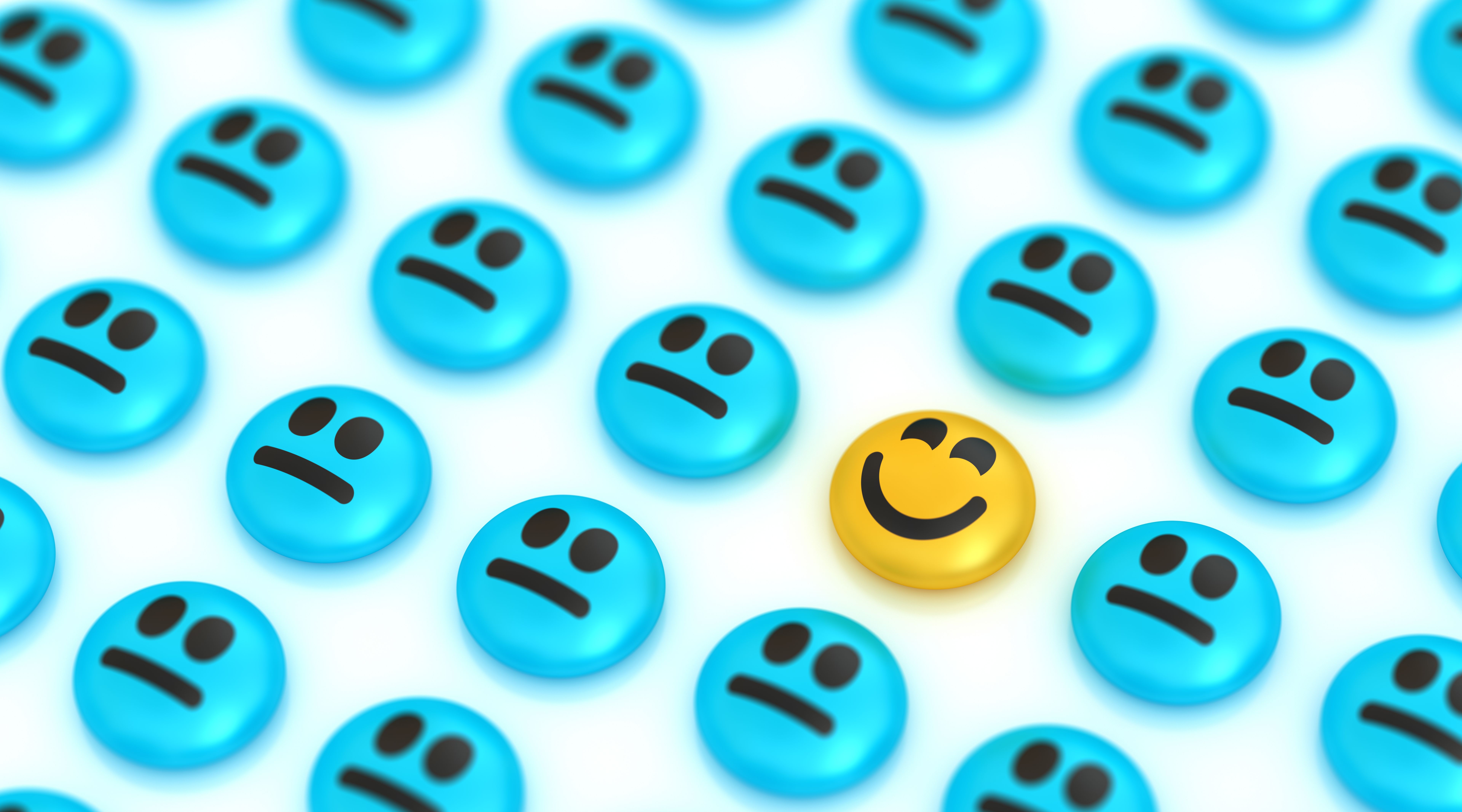 Unique positive smiley face. Standing out from the crowd.