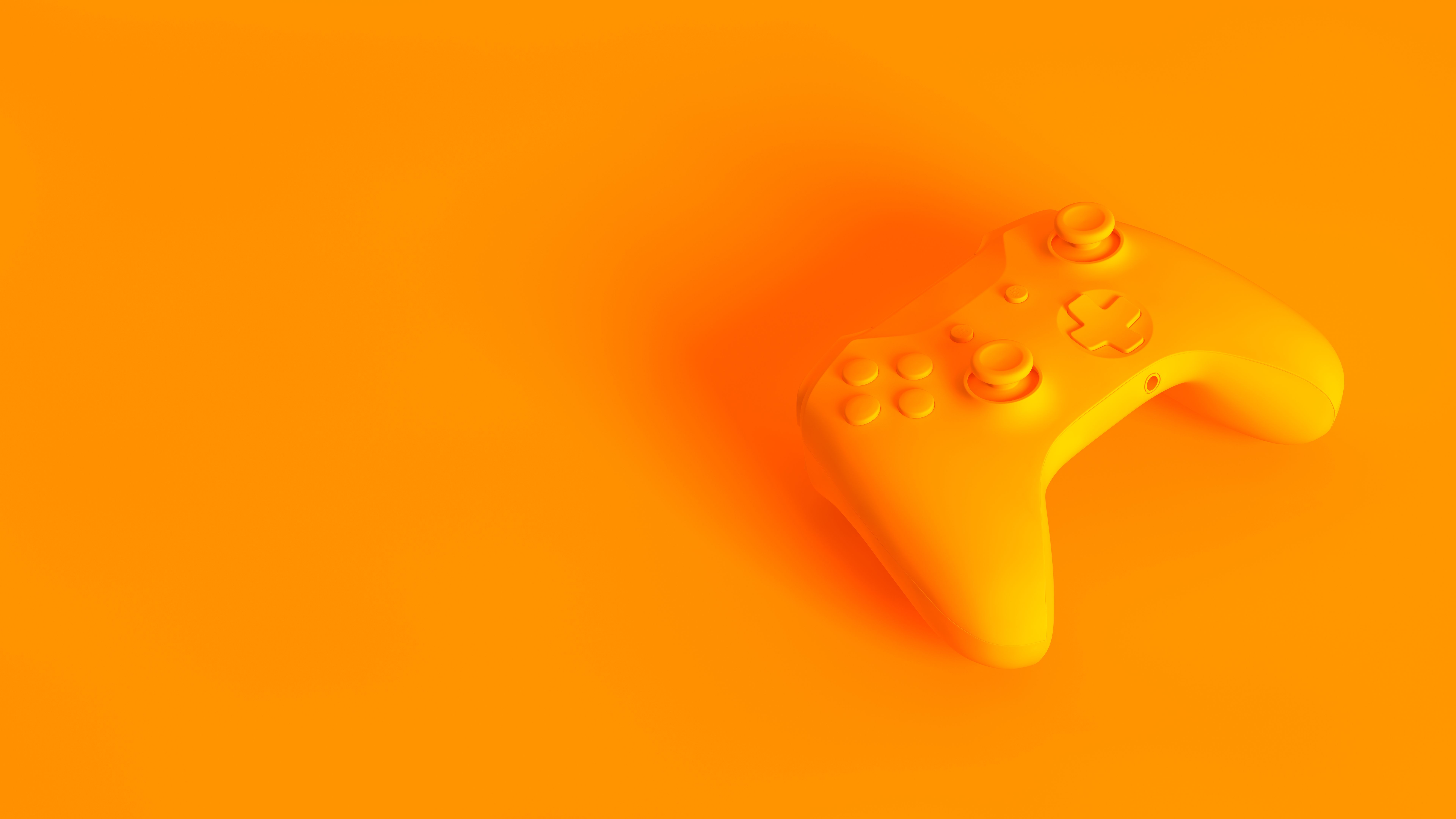 Conceptual isometric image. Gamepad fully toned in orange color.