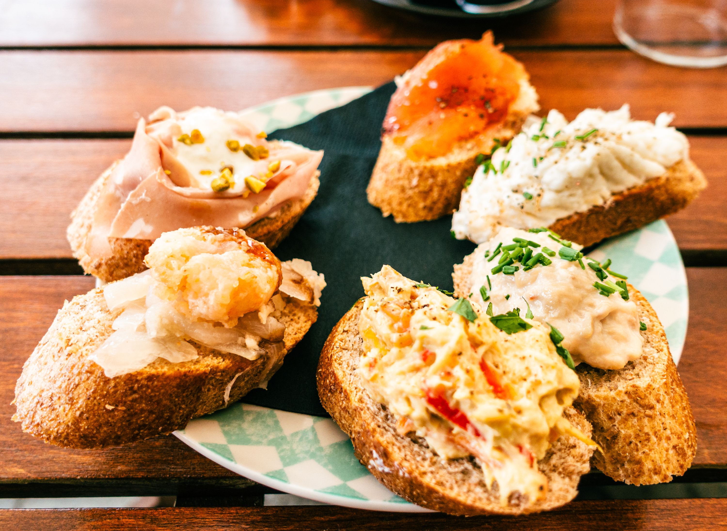 Venice, Vento  IT  Oct 14, 2024 Cicchetti are vibrant, bite-sized snacks. Close-up, they reveal rich colors: golden bread, creamy cheeses and fresh seafood artfully arranged