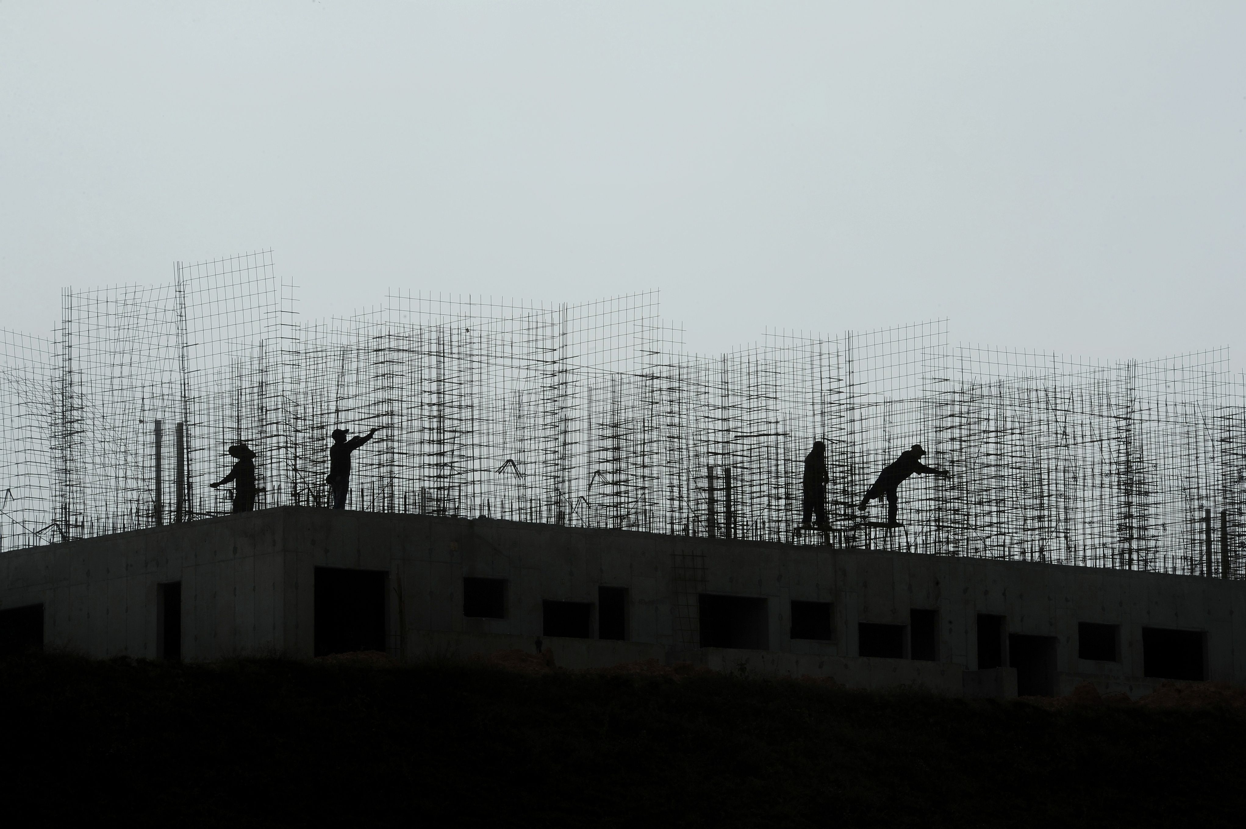 trabalhadores construcao