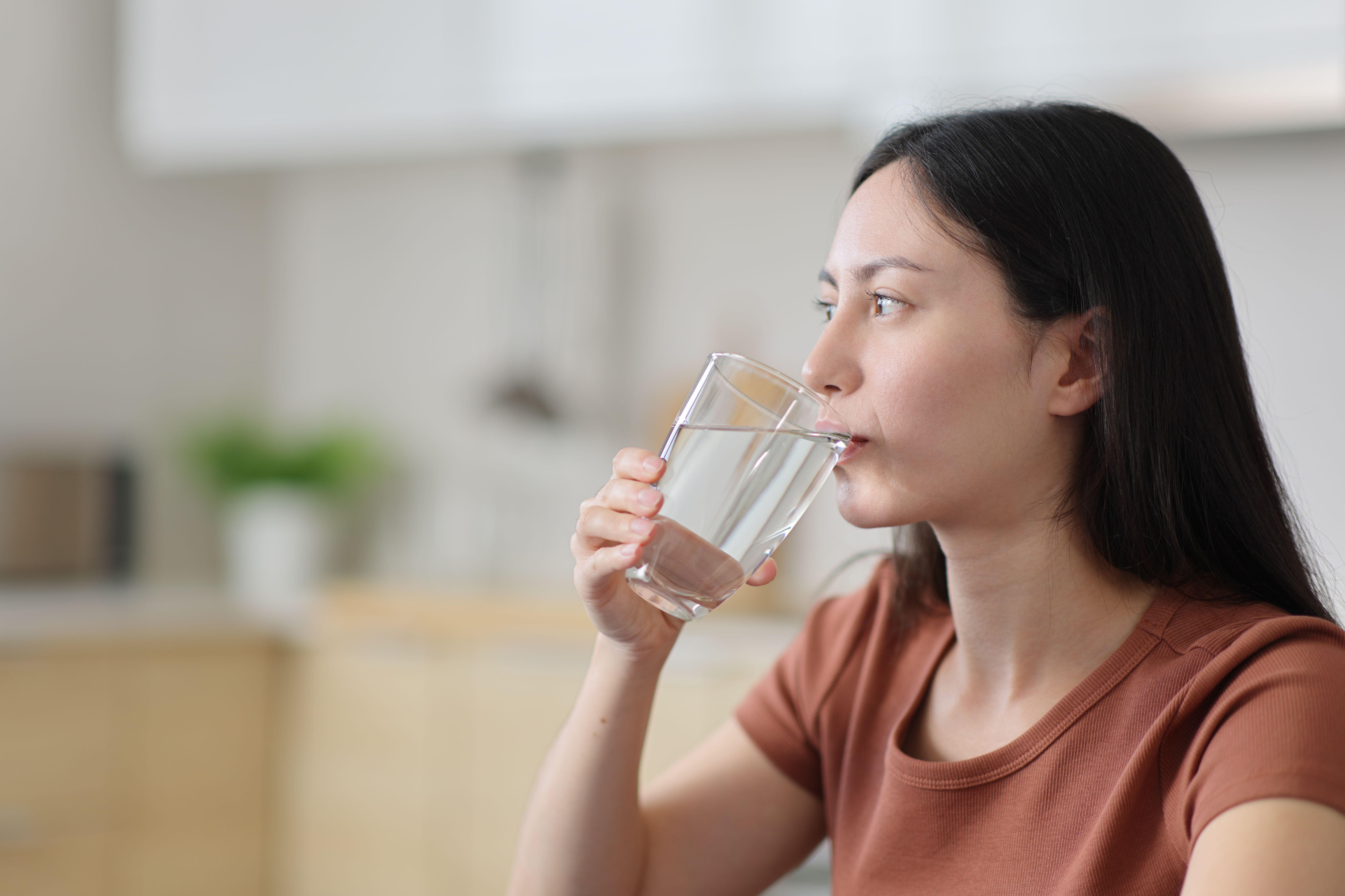 drinking water after smoking a cigarette Quitting Tobacco: How Can Be Your Secret Weapon Woman Smoking Cigarette Drinking Glass
