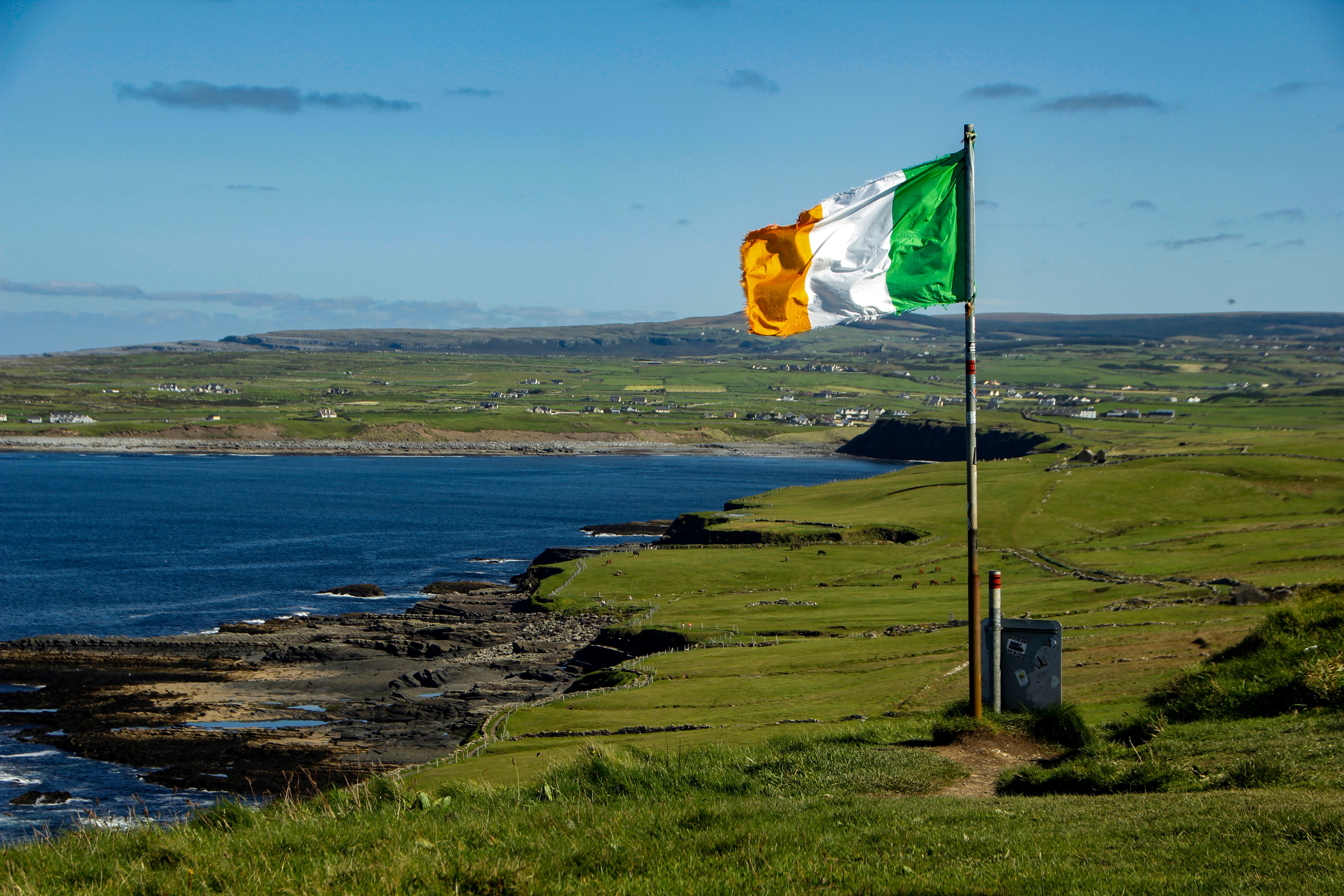 Irish flag at the Cliffs of Moher, Clare, Ireland