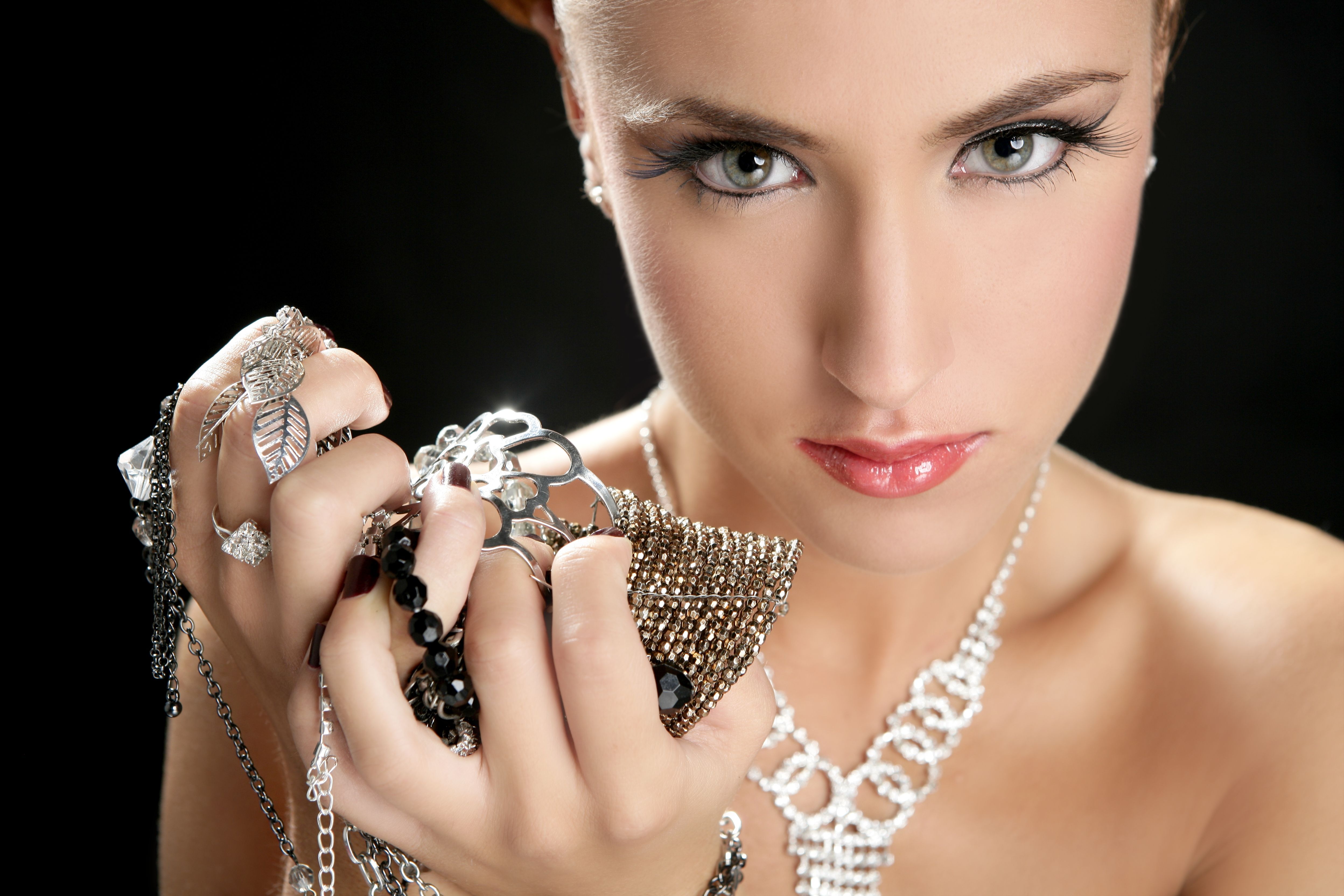 Ambition and greed in fashion woman with jewelry