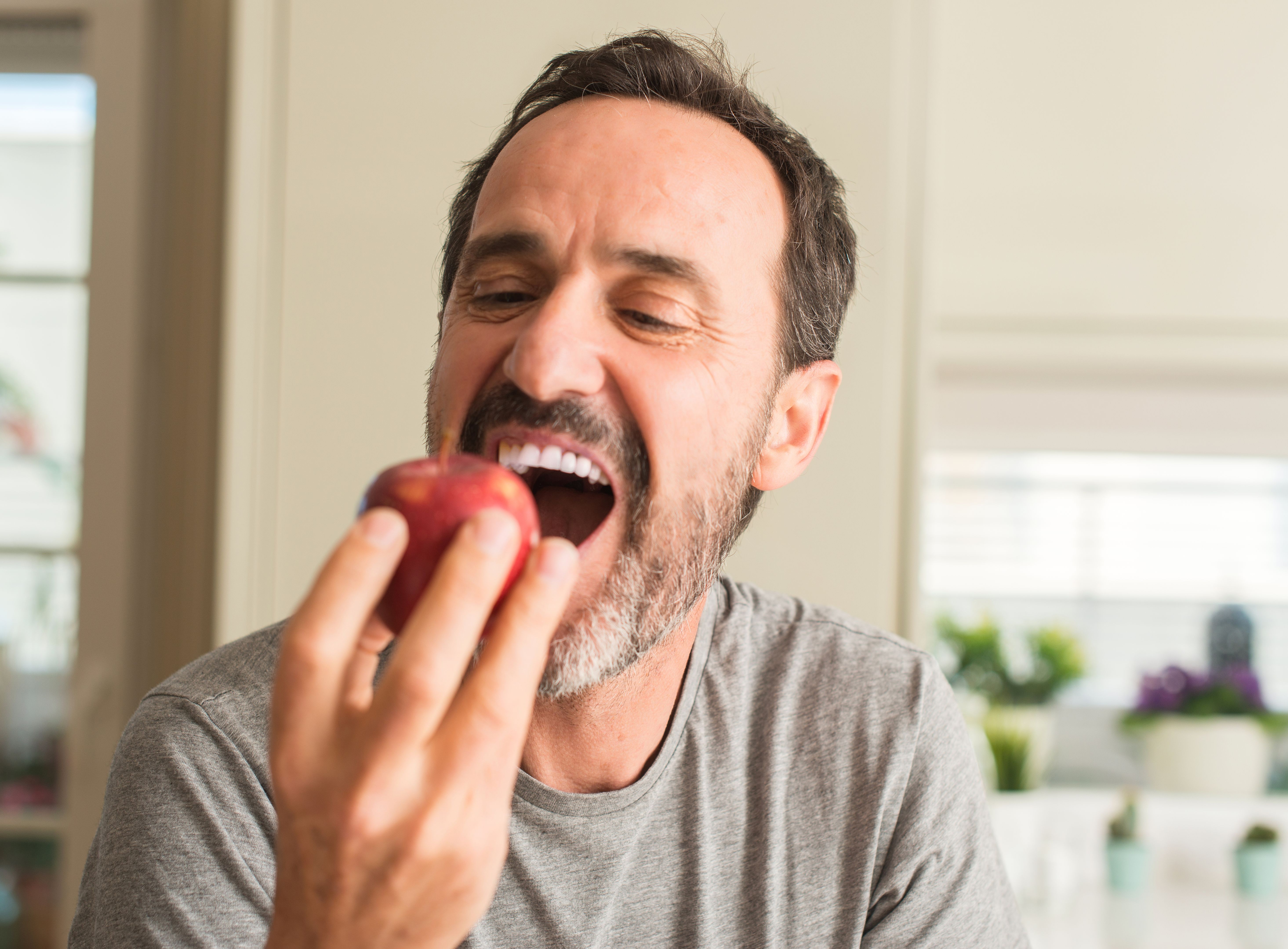 person eating apple