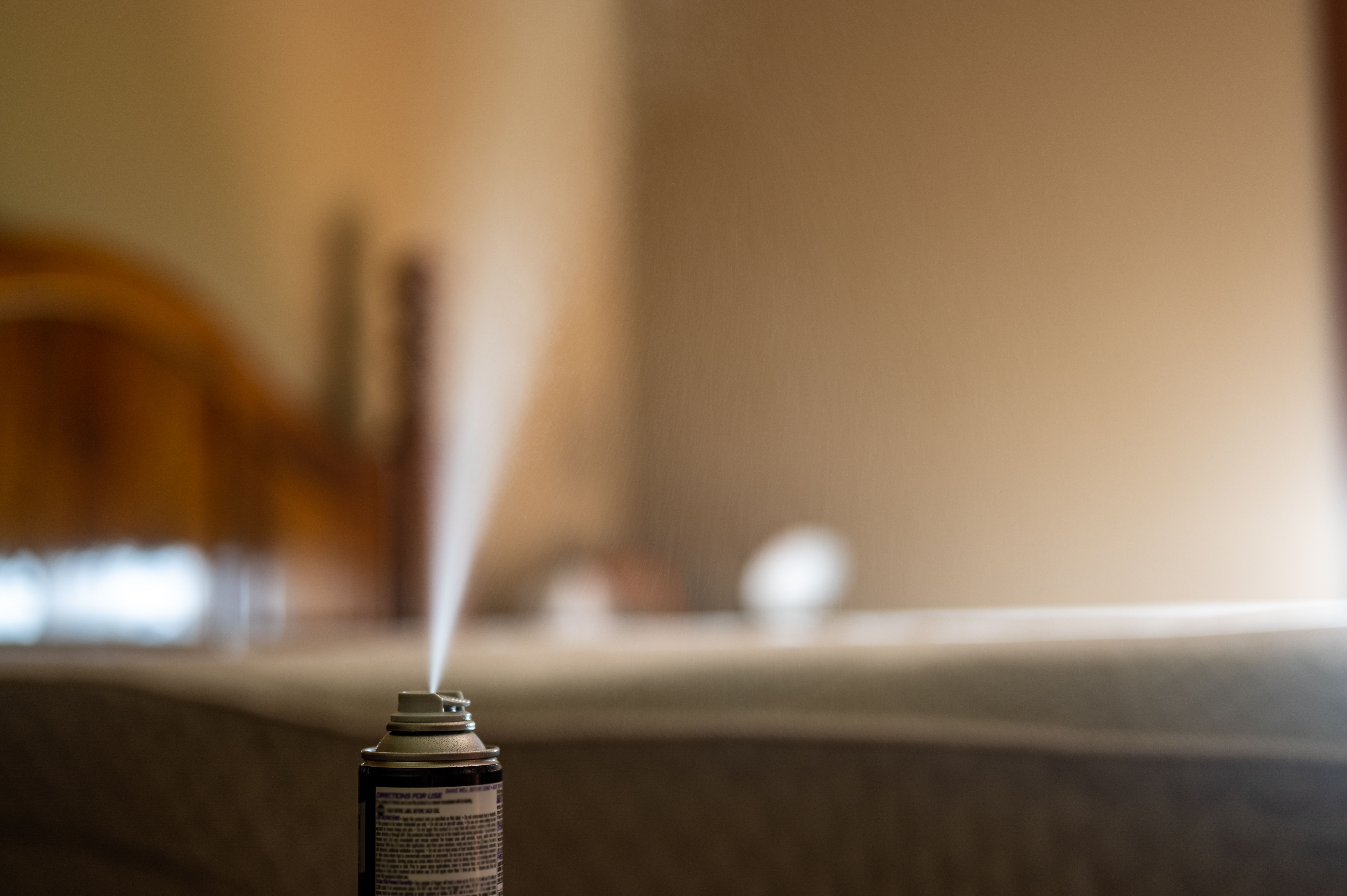 Selective focus on insect insecticide aerosol can fogger used to kill bed bugs, spiders, mites, flies, and fleas Selective focus on insect insecticide aerosol can fogger used to kill bed bugs, spiders, mites, flies, and fleas