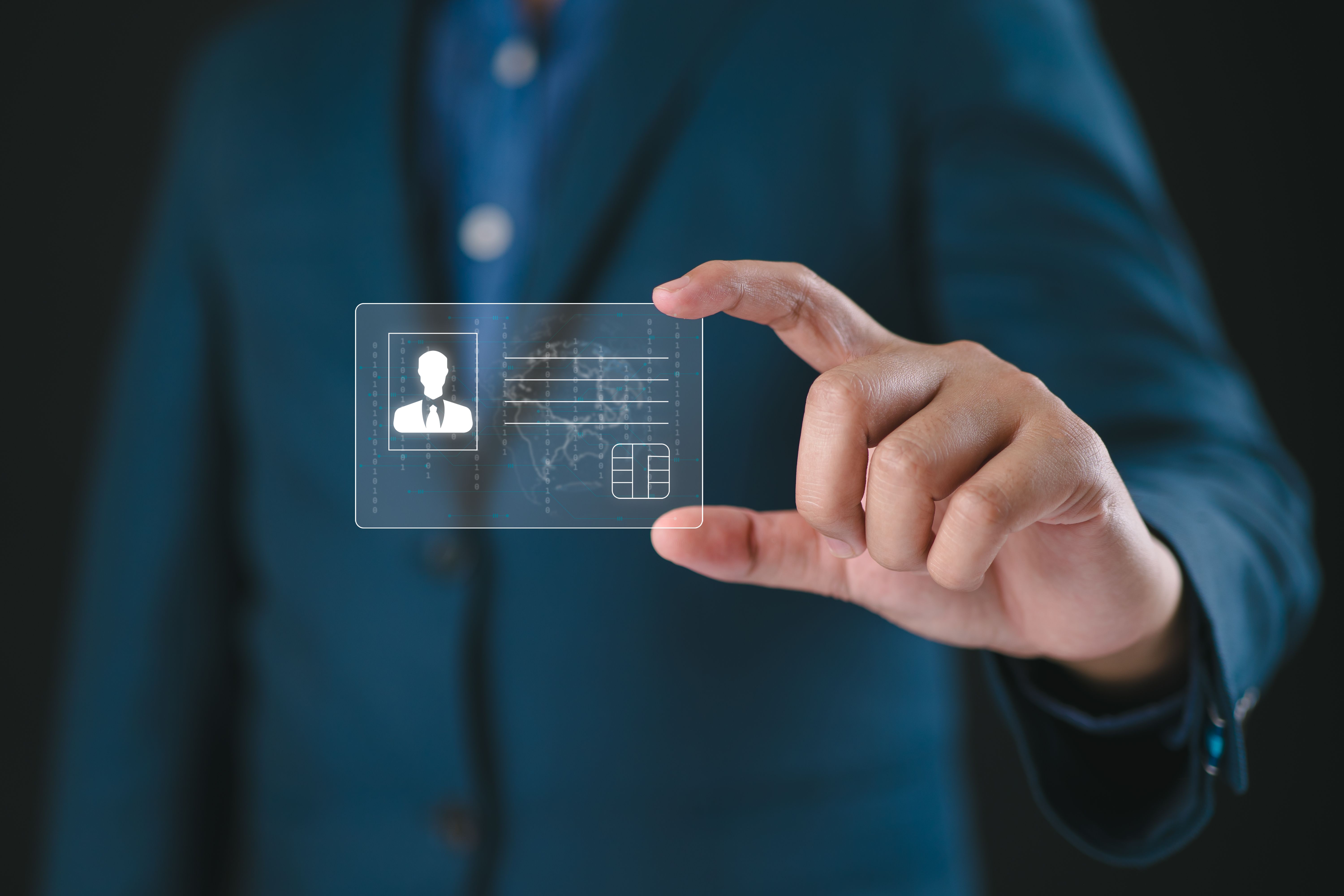 Businessman hand holding digital identification card, technology and innovation concept. Hand and digital identification card or digital ID. Businessman hand holding digital identification card, technology and innovation concept. Hand and digital identification card or digital ID.