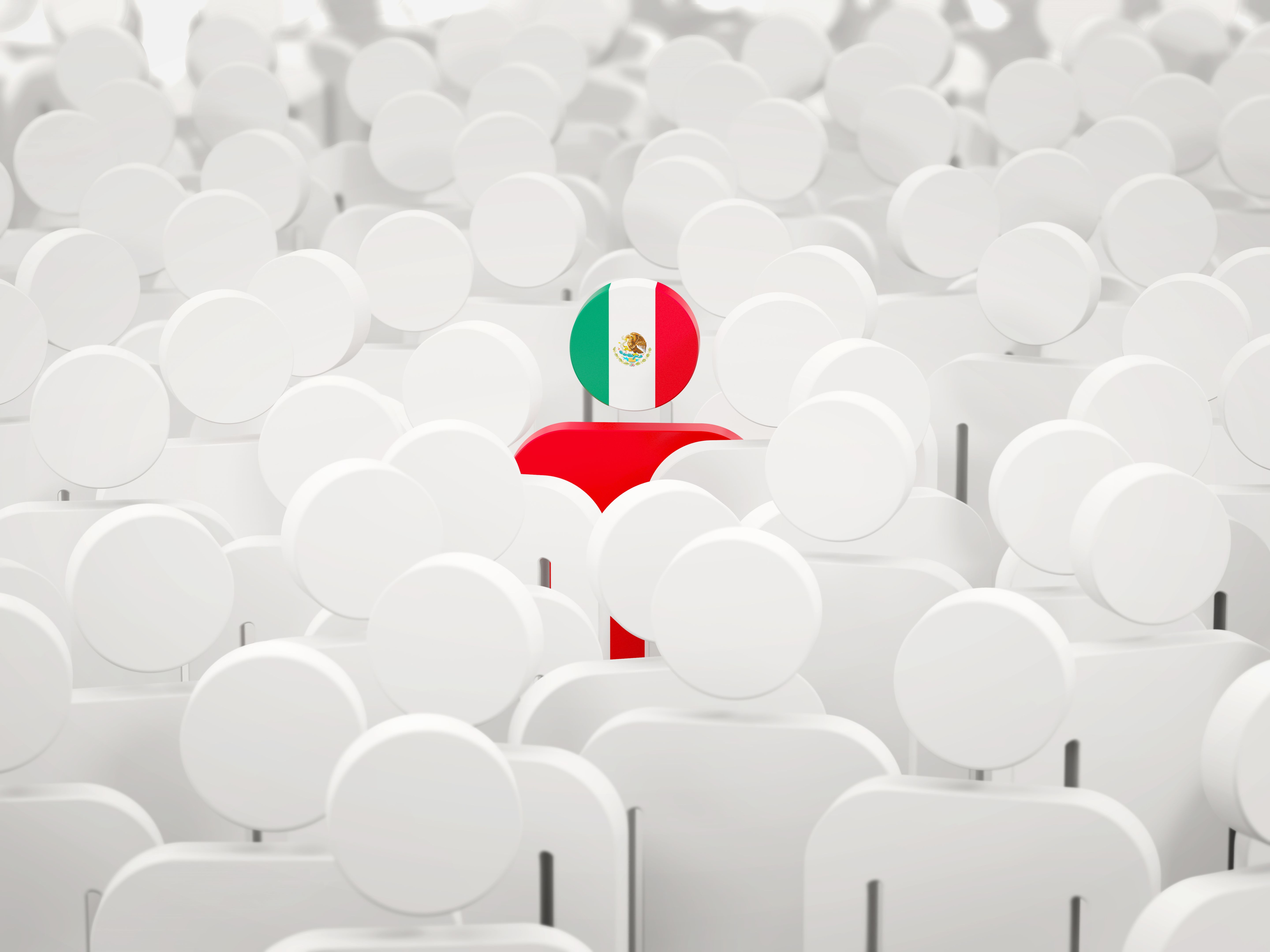 Man with flag of mexico in a crowd