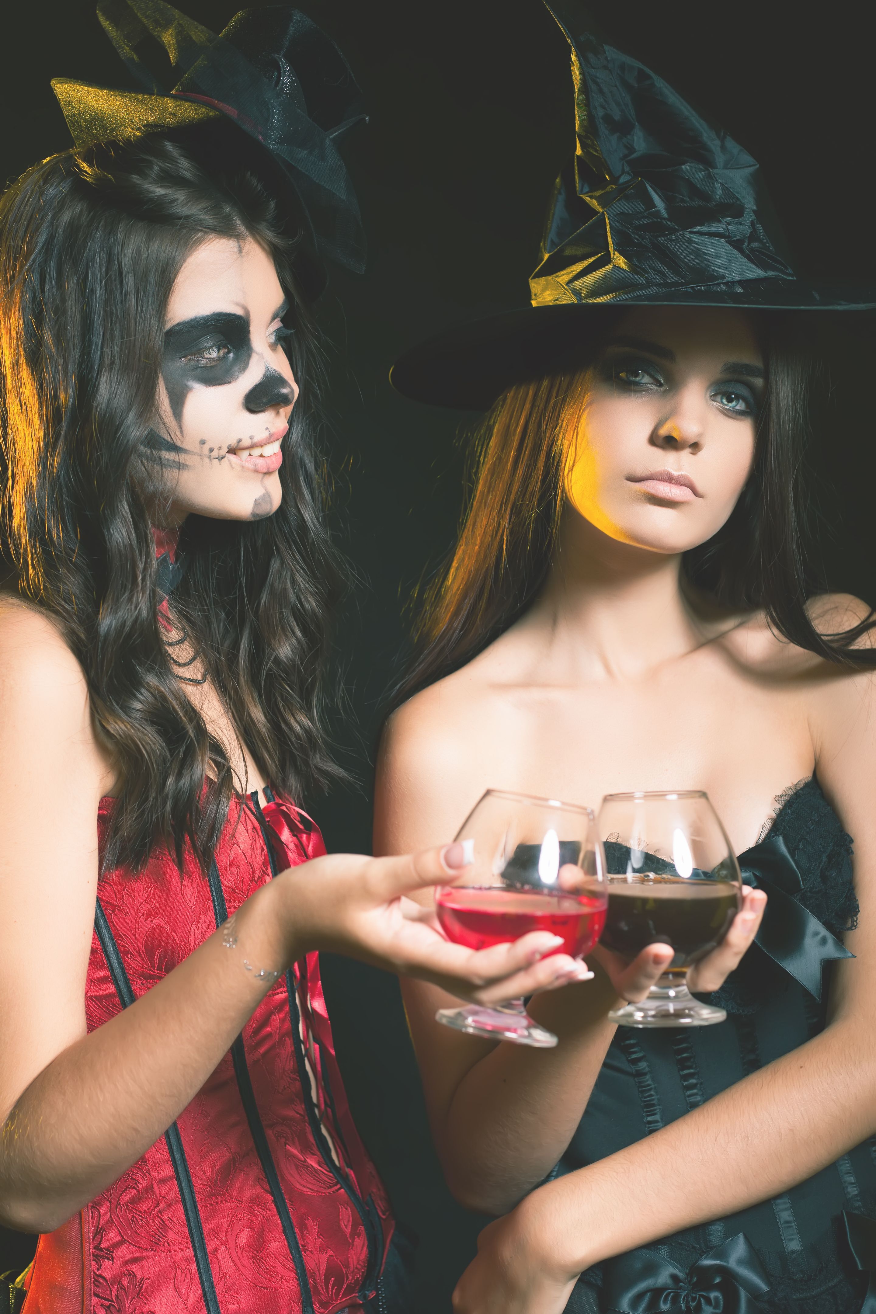 Halloween party 2016! Fashion women like witch holding cocktail Halloween party 2016! Fashion women like witch holding cocktail