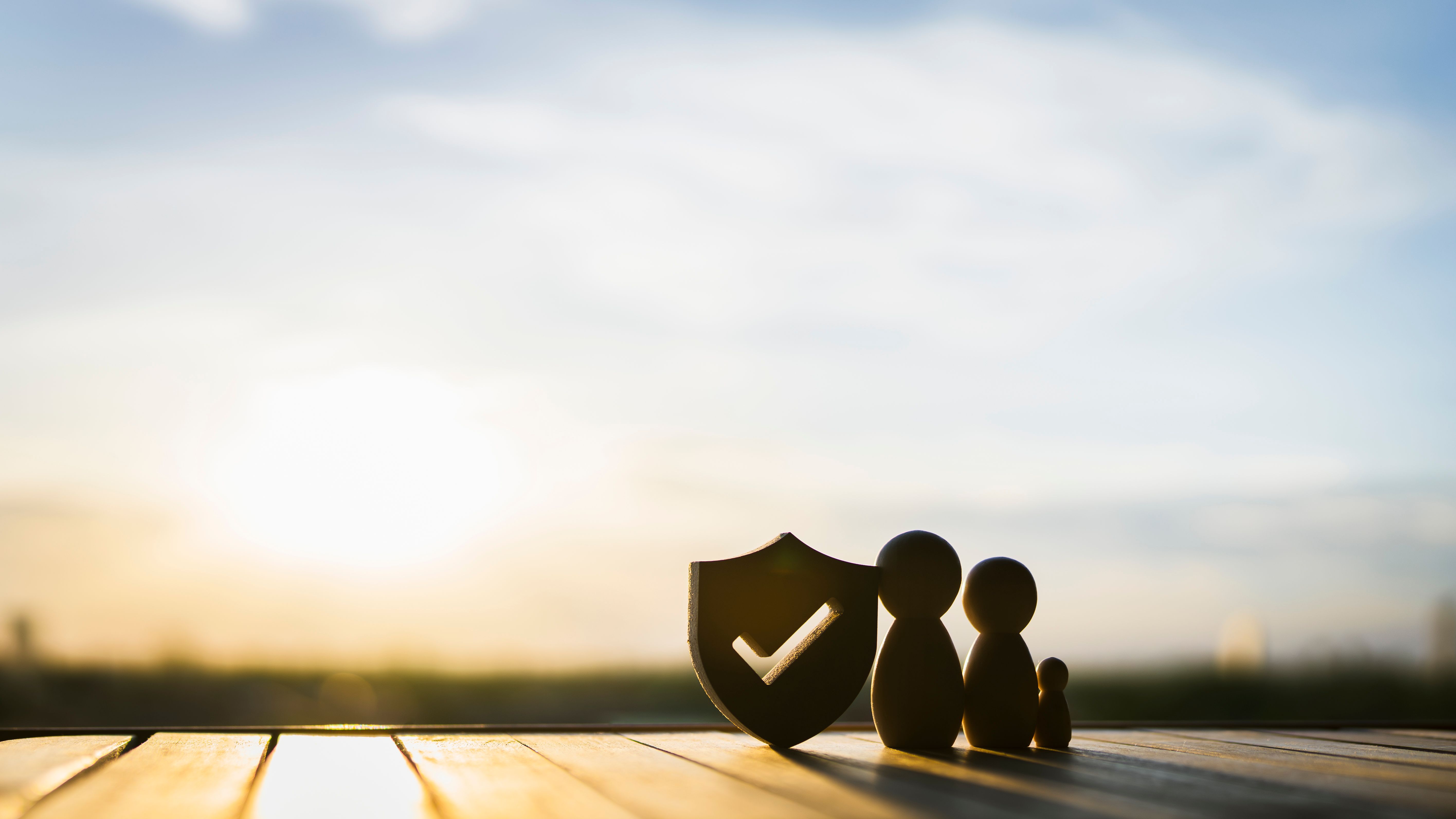 Shield protect icon and family model, Security protection and health insurance. The concept of family home, protection, health care day, car insurance.