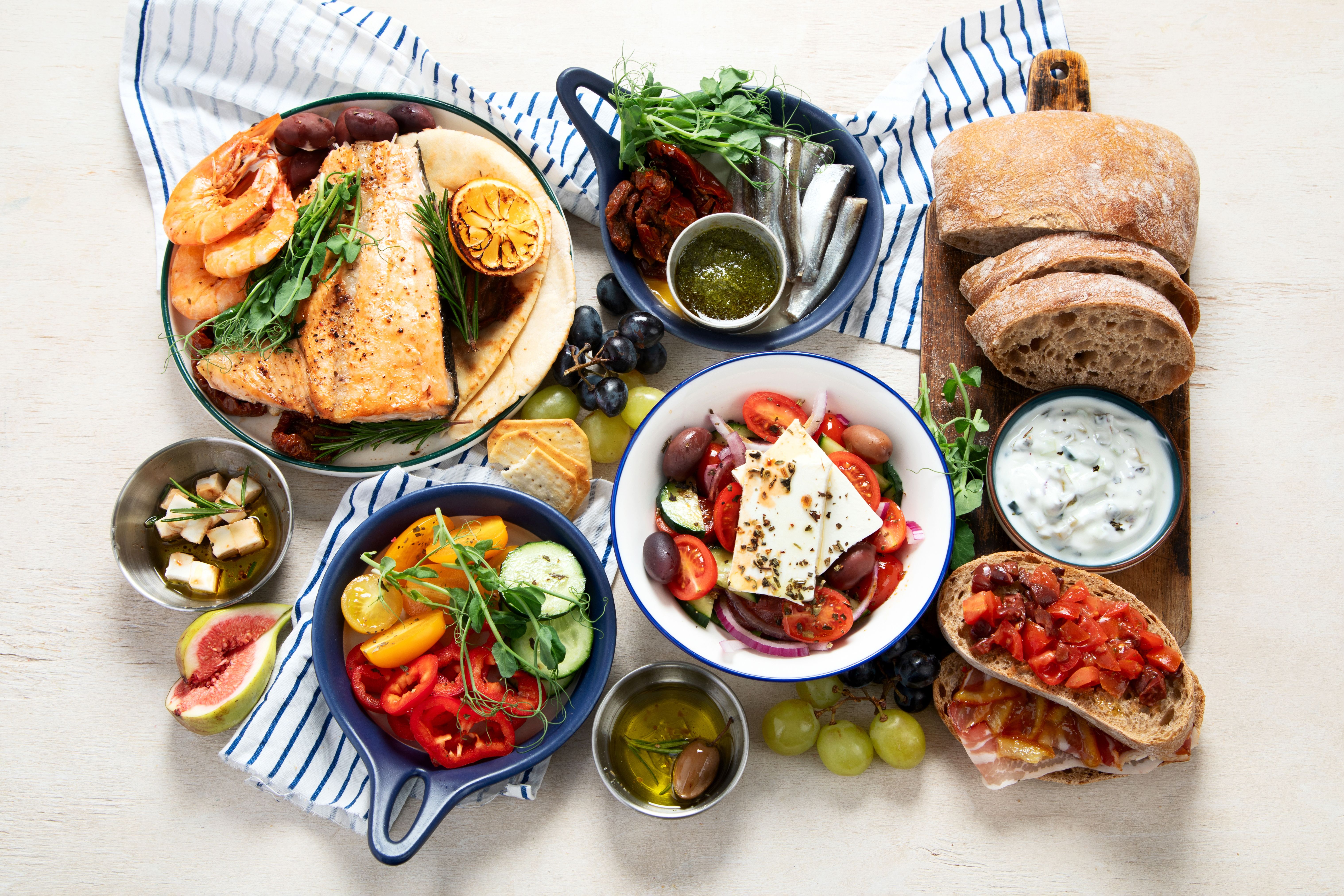 Mediterranean theme food table scene. Mediterranean theme food table scene.