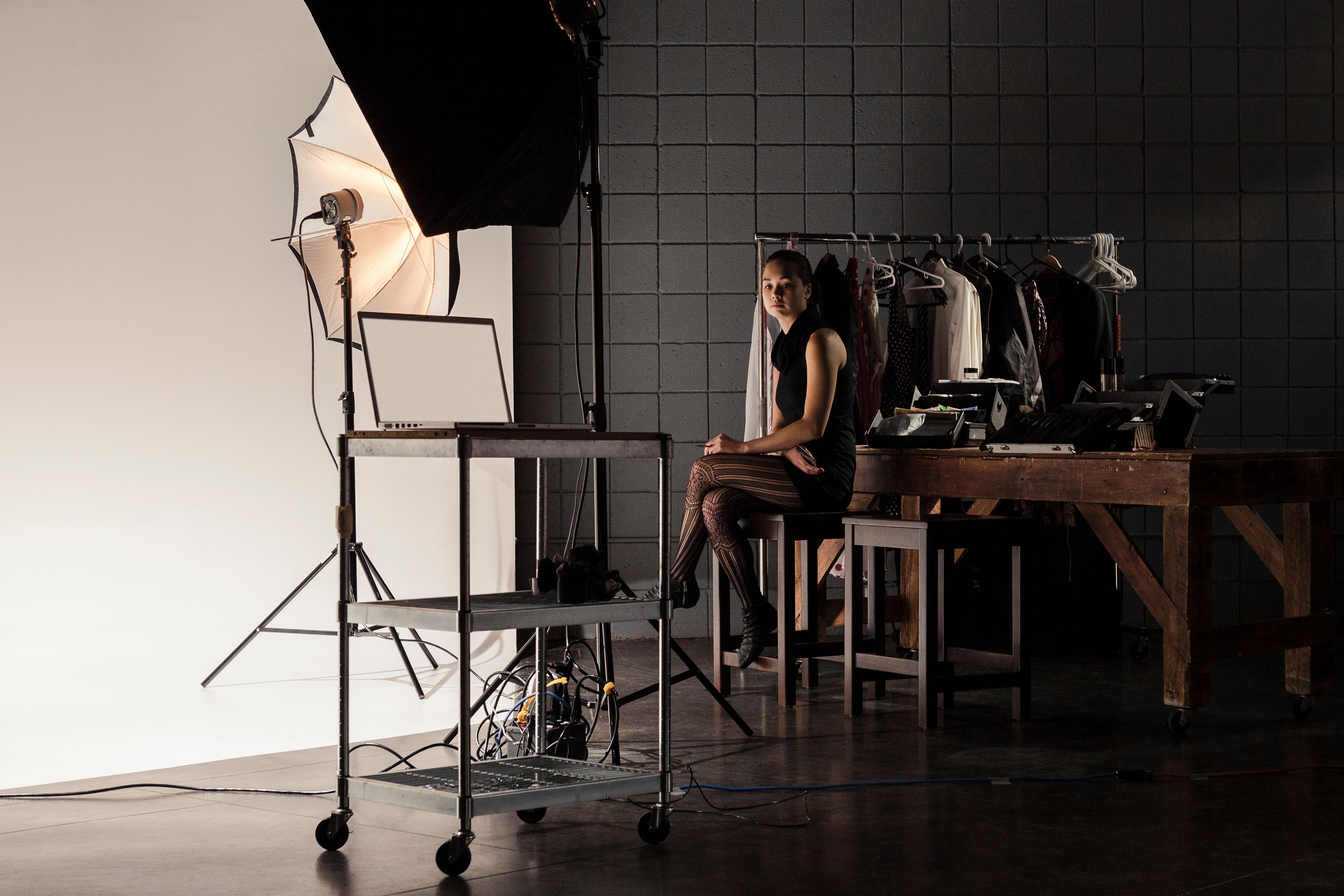 Makeup Artist Working Behind the Scenes while Filming on a Film Set