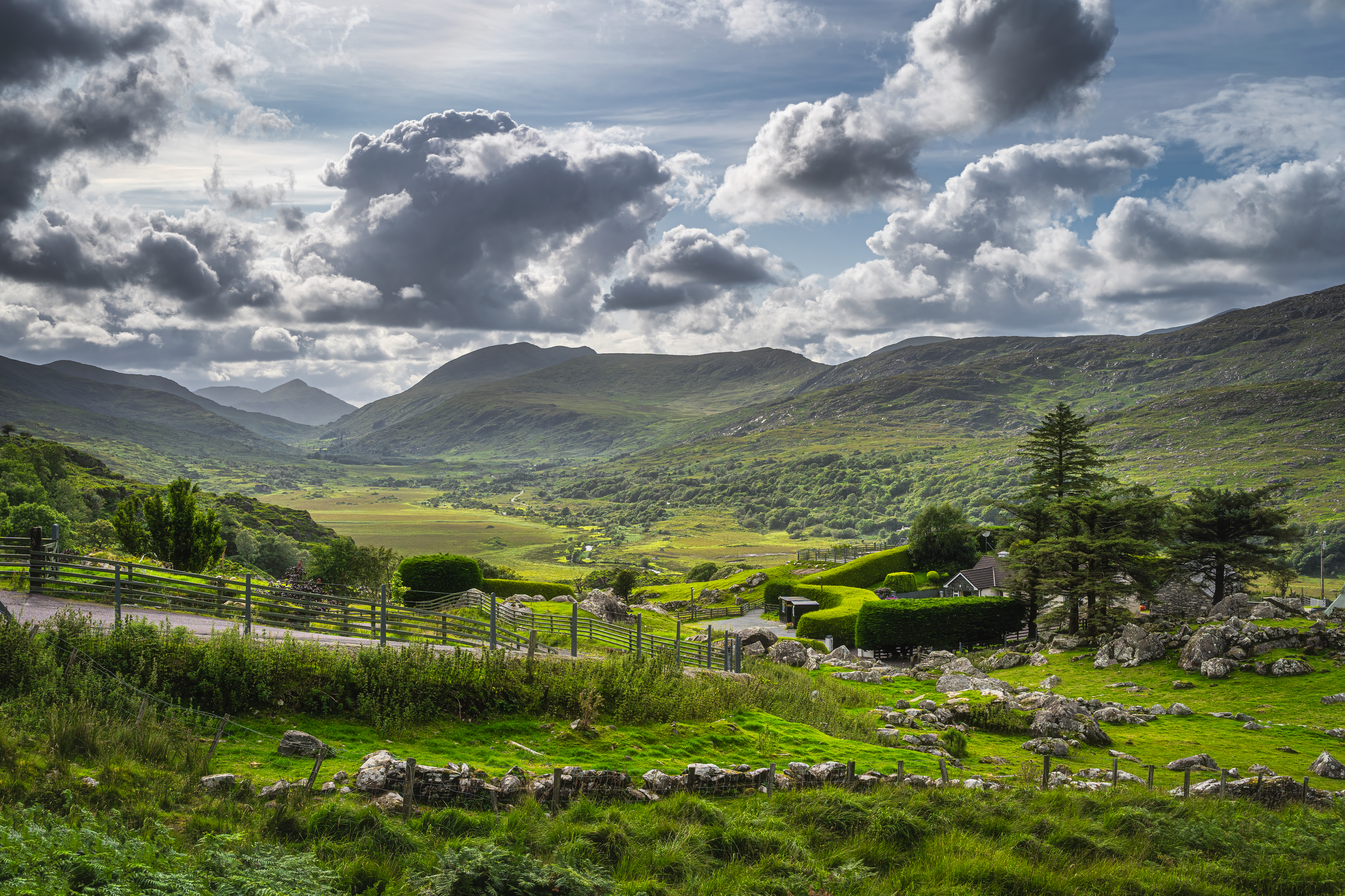 Beautiful Molls Gap with Owenreagh River valley, MacGillycuddys Reeks mountains and sheep farms