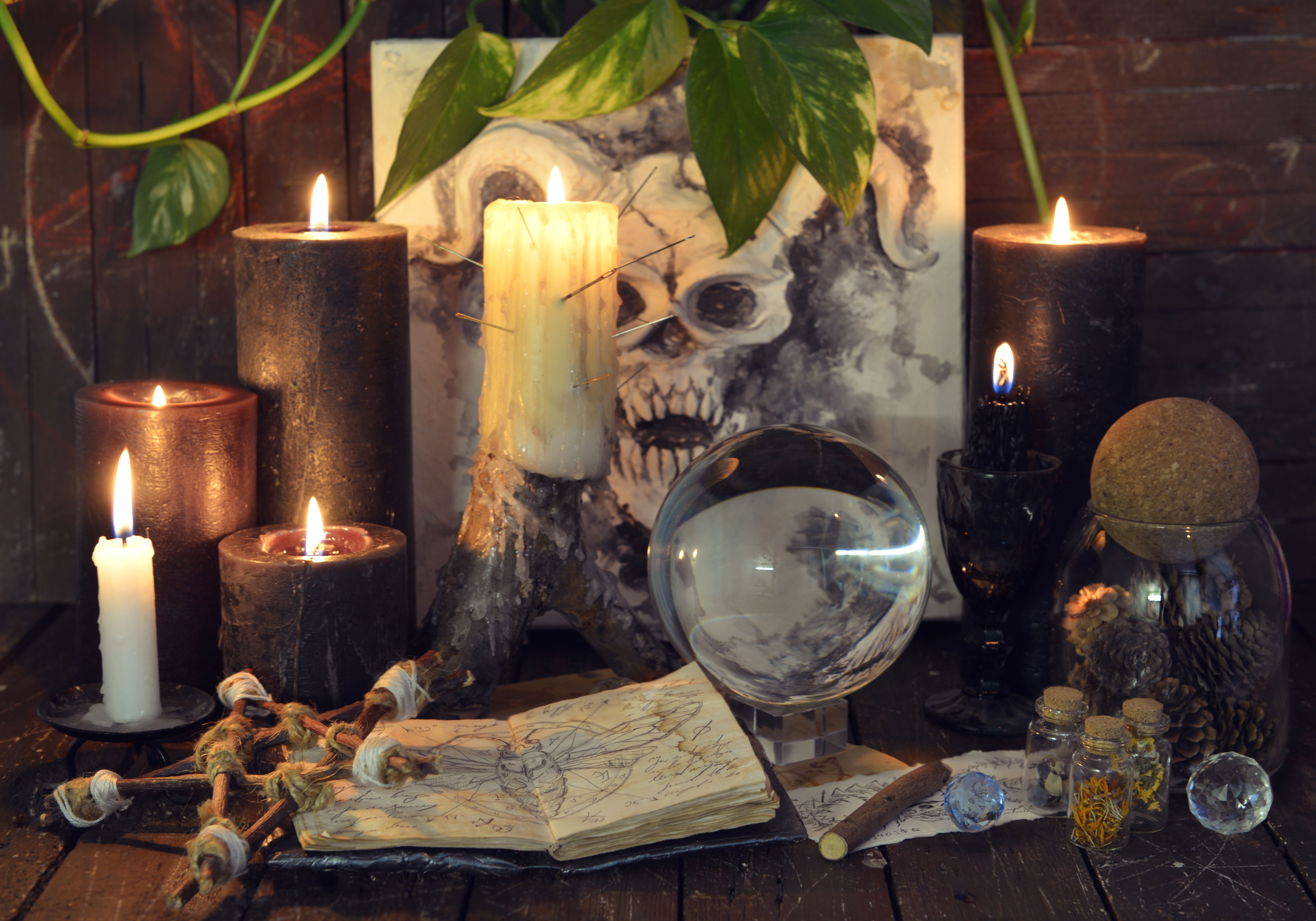 Wicca, esoteric and occult still life with vintage magic objects on witch table altar for mystic rituals and fortune telling. Halloween and gothic concept Wicca, esoteric and occult still life with vintage magic objects on witch table altar for mystic rituals and fortune telling. Halloween and gothic concept