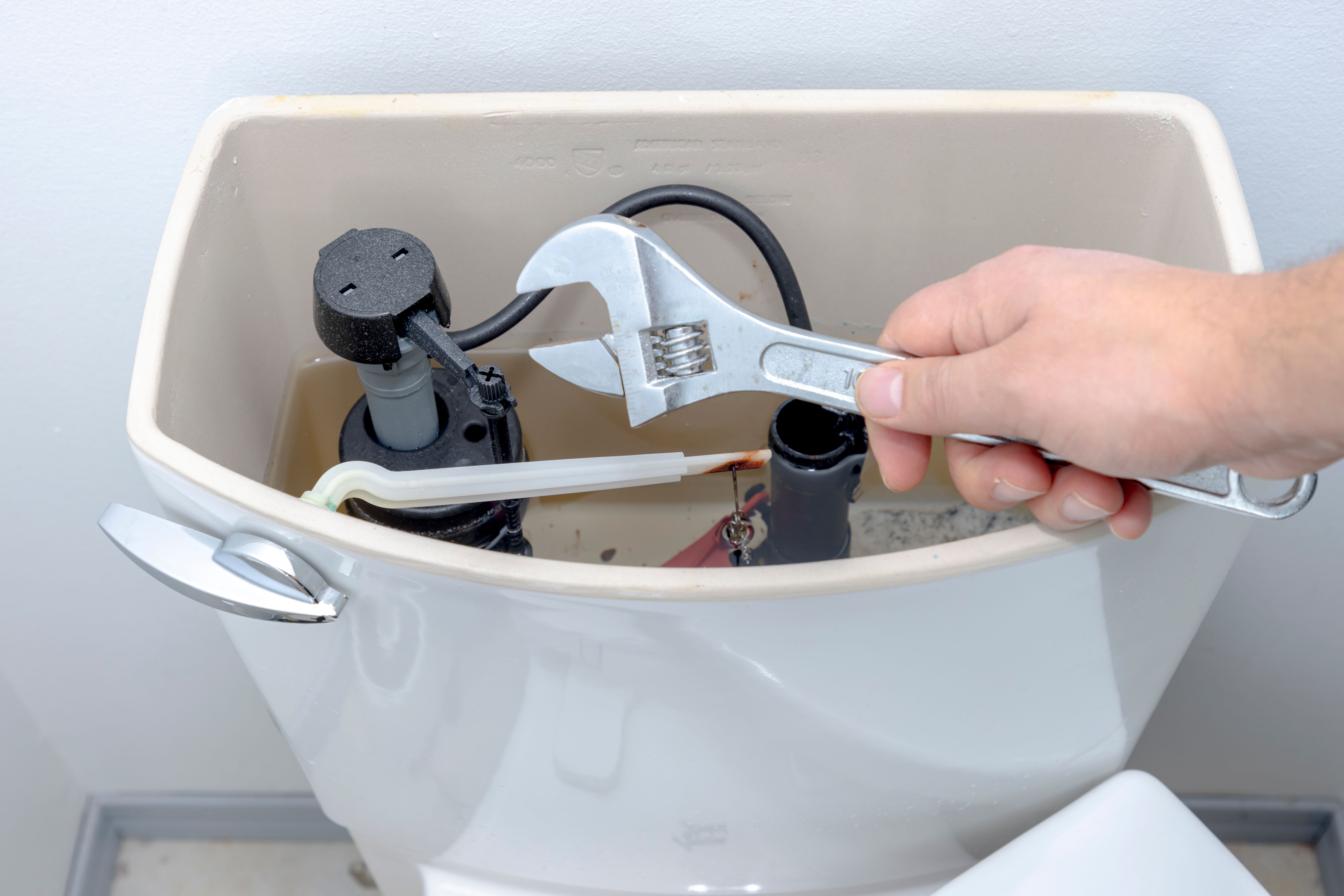 repairing toilet