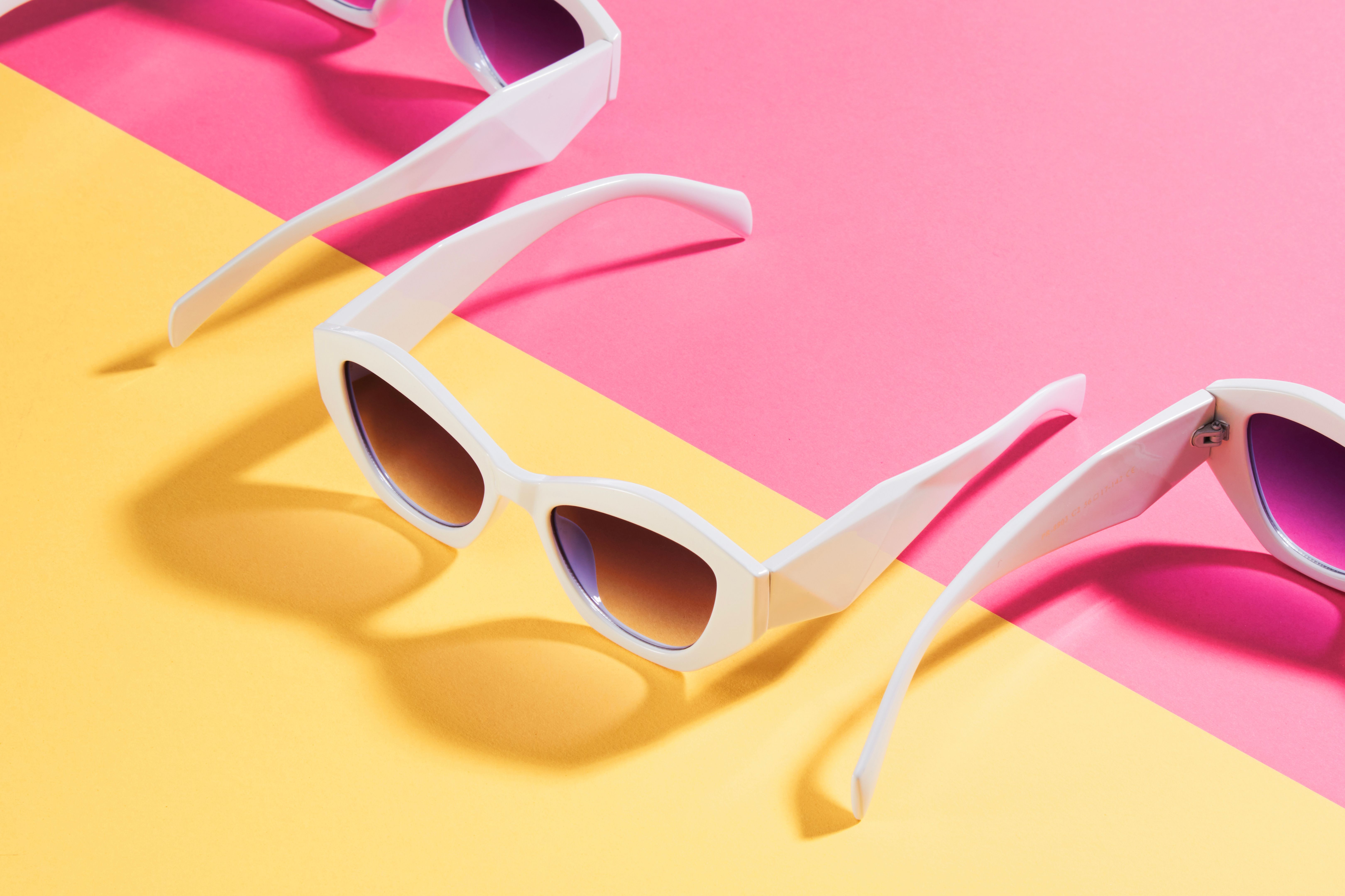 Sun Glasses Over Colored Background Sun Glasses Over Colored Background