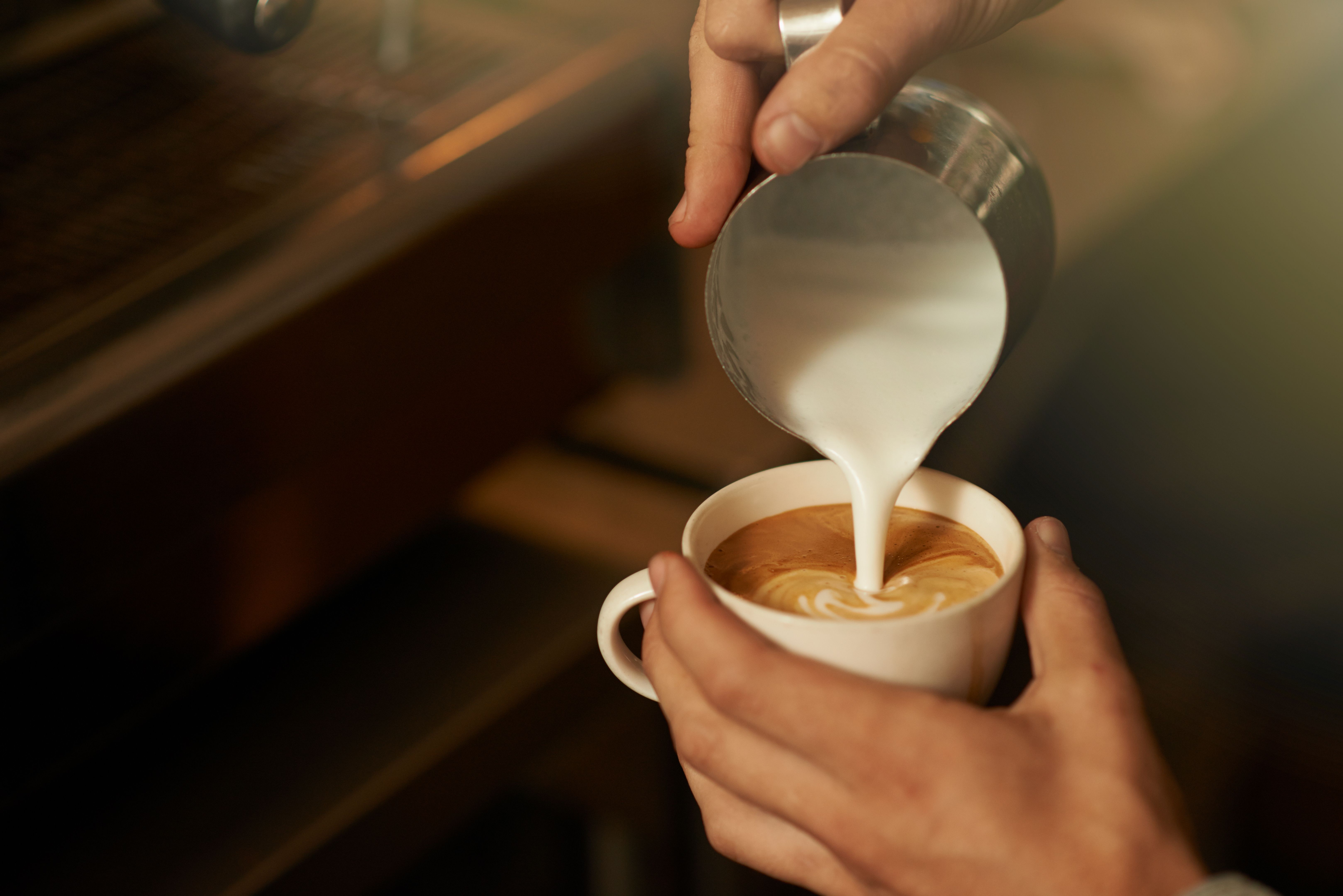 barista making coffee