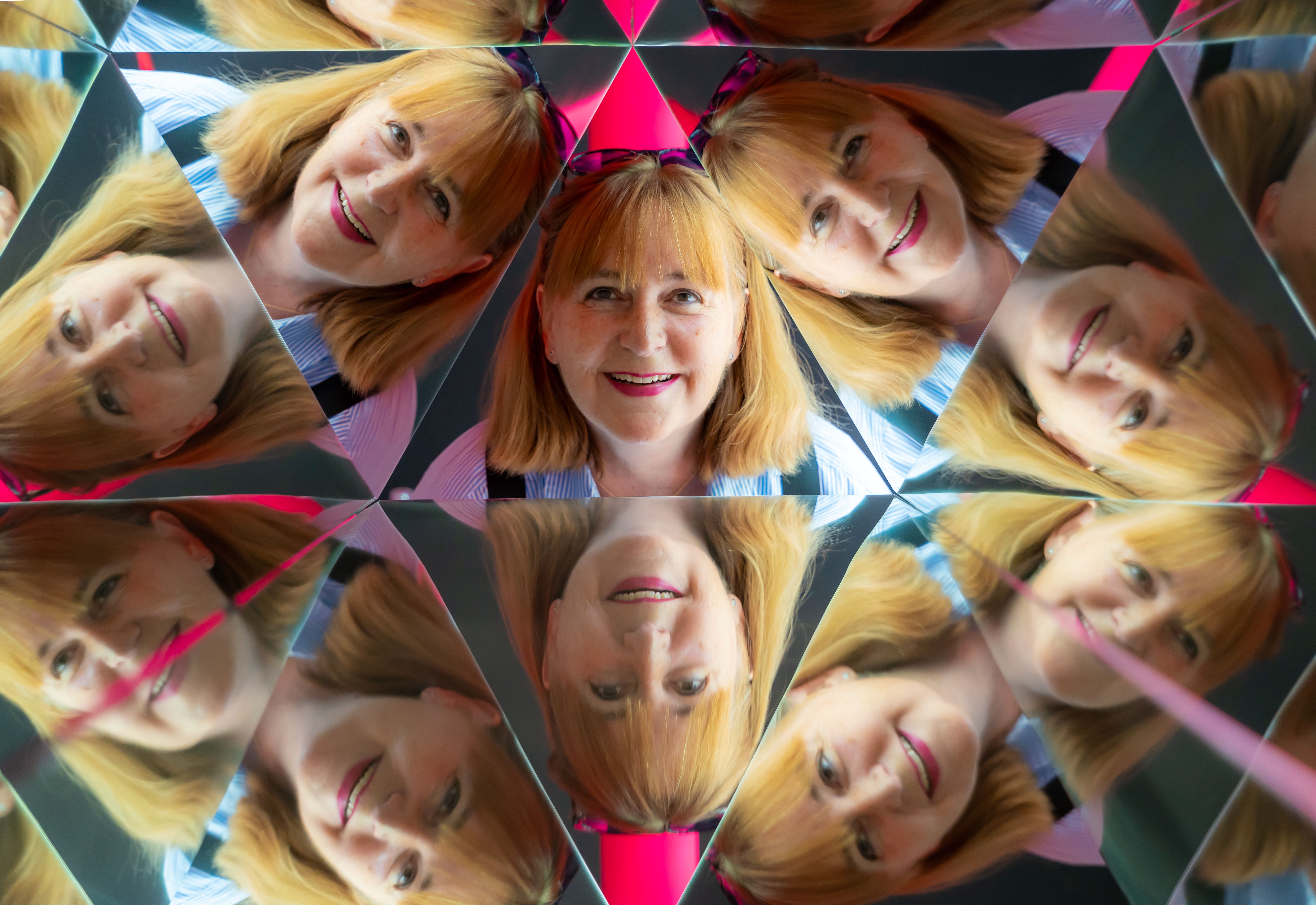 Portrait picture of a woman in kaleidoscope style