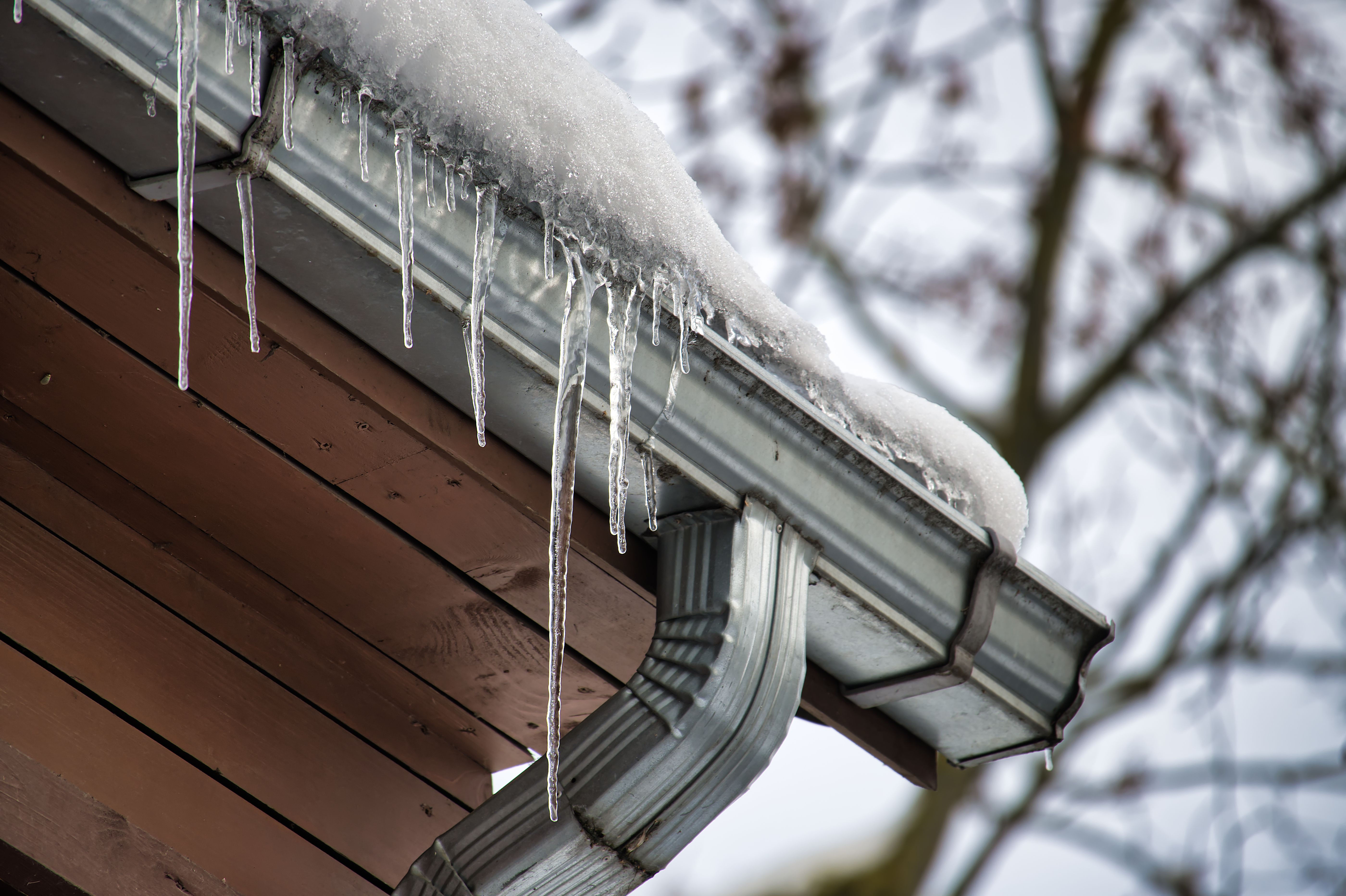 snowy house gutters