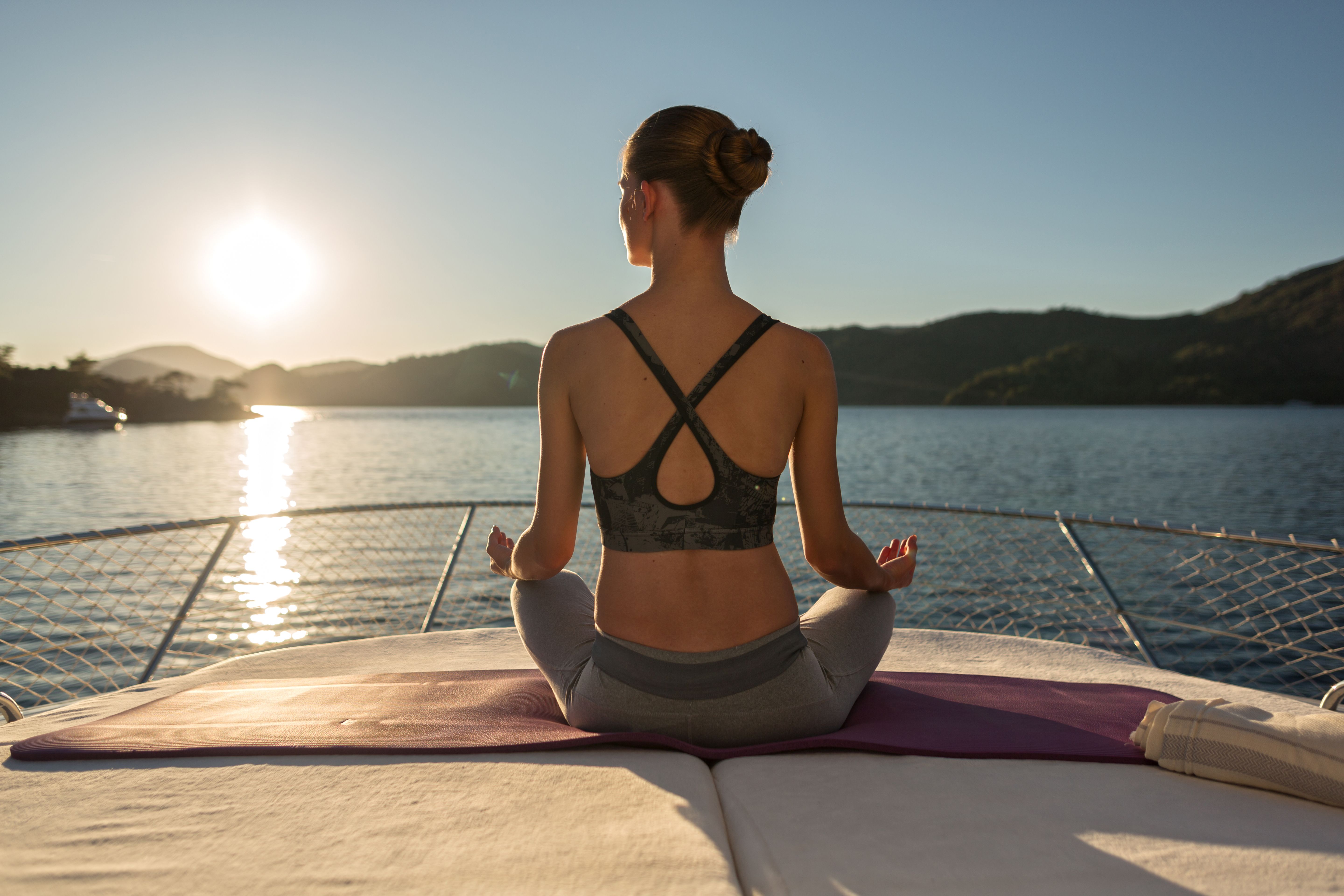sunset yoga boat